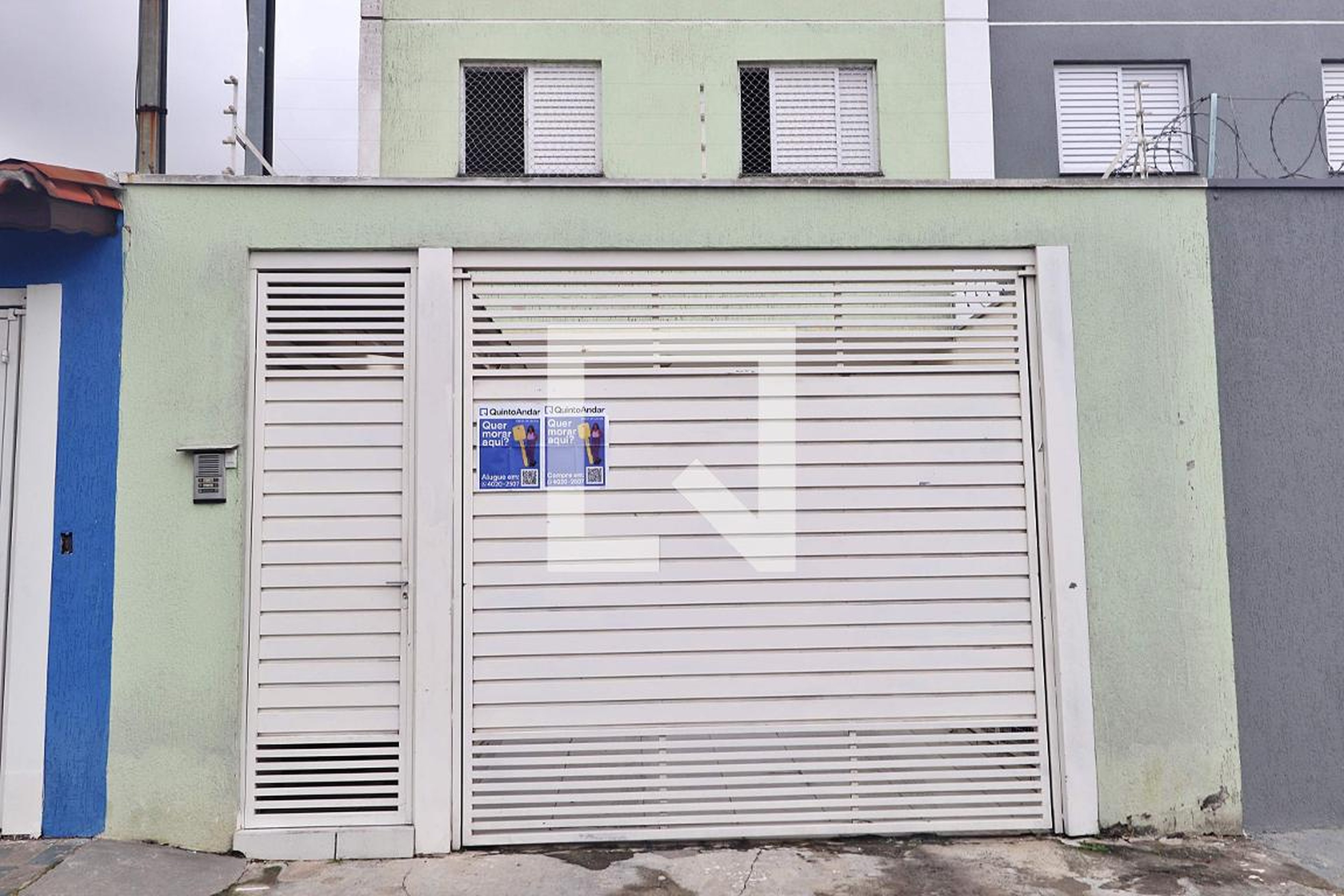 Fachada Condomínio em Rua Taguá, 48