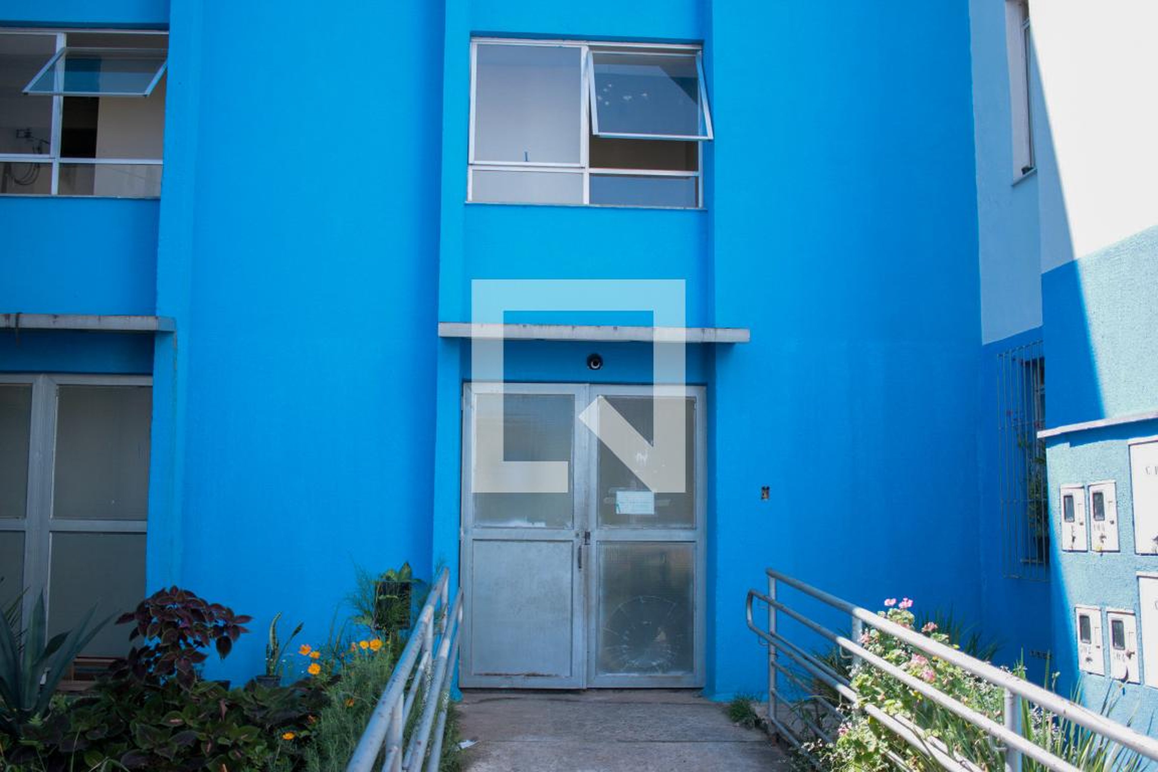 Fachada Condomínio em Rua Um, 46