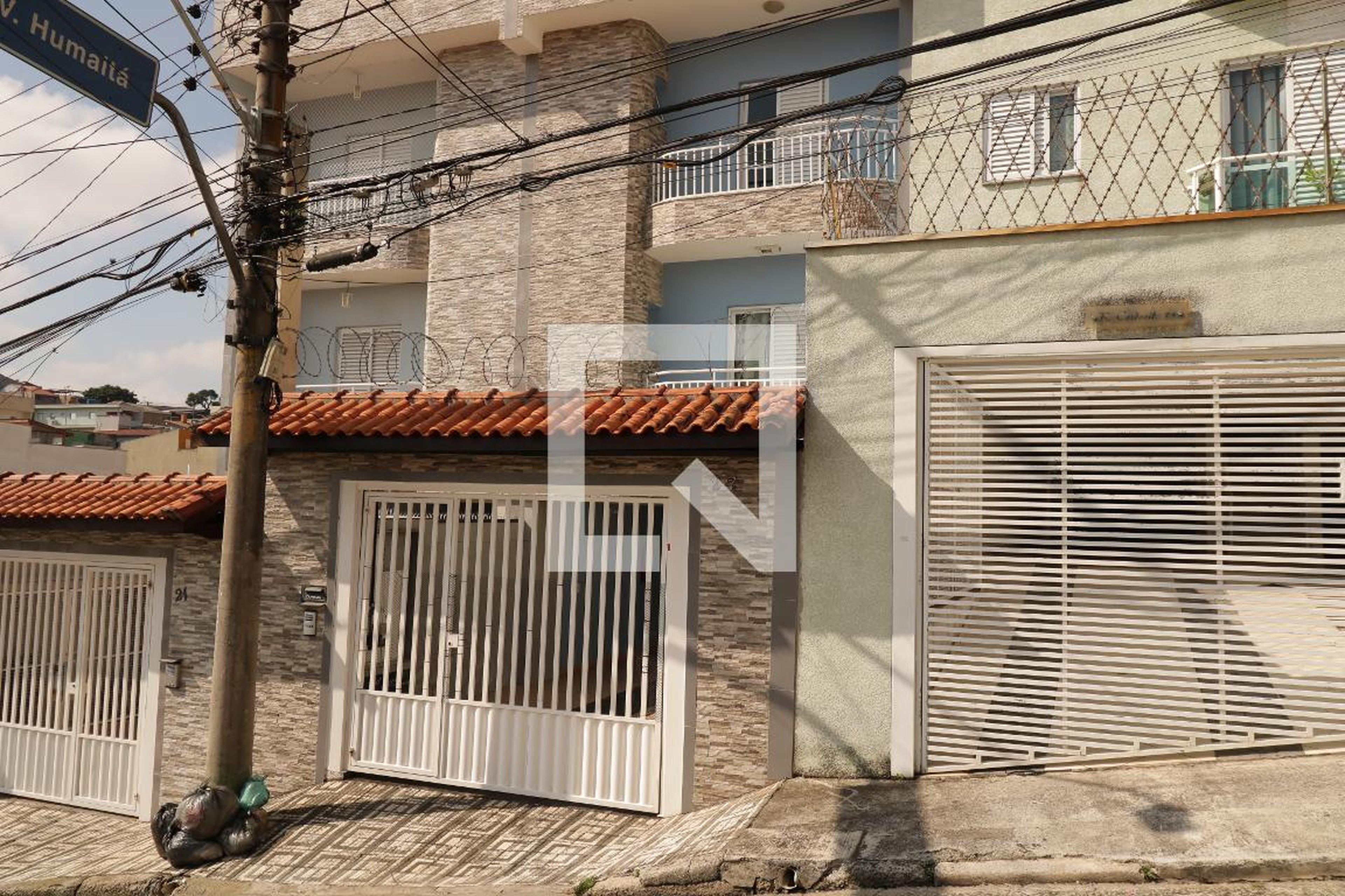 Fachada Condomínio em Rua Cordovil, 23