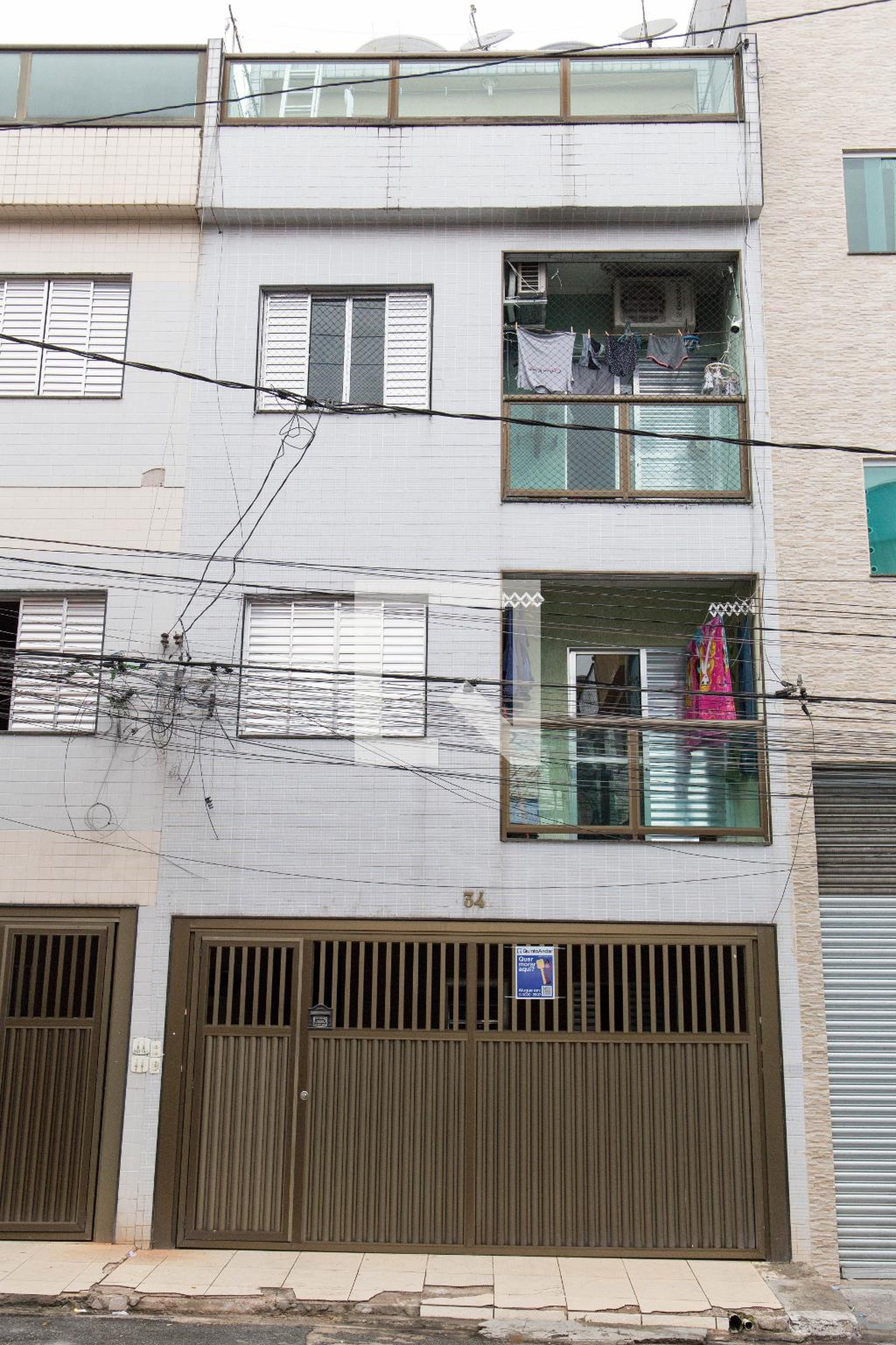 Fachada Condomínio em Rua Por do Sol, 34