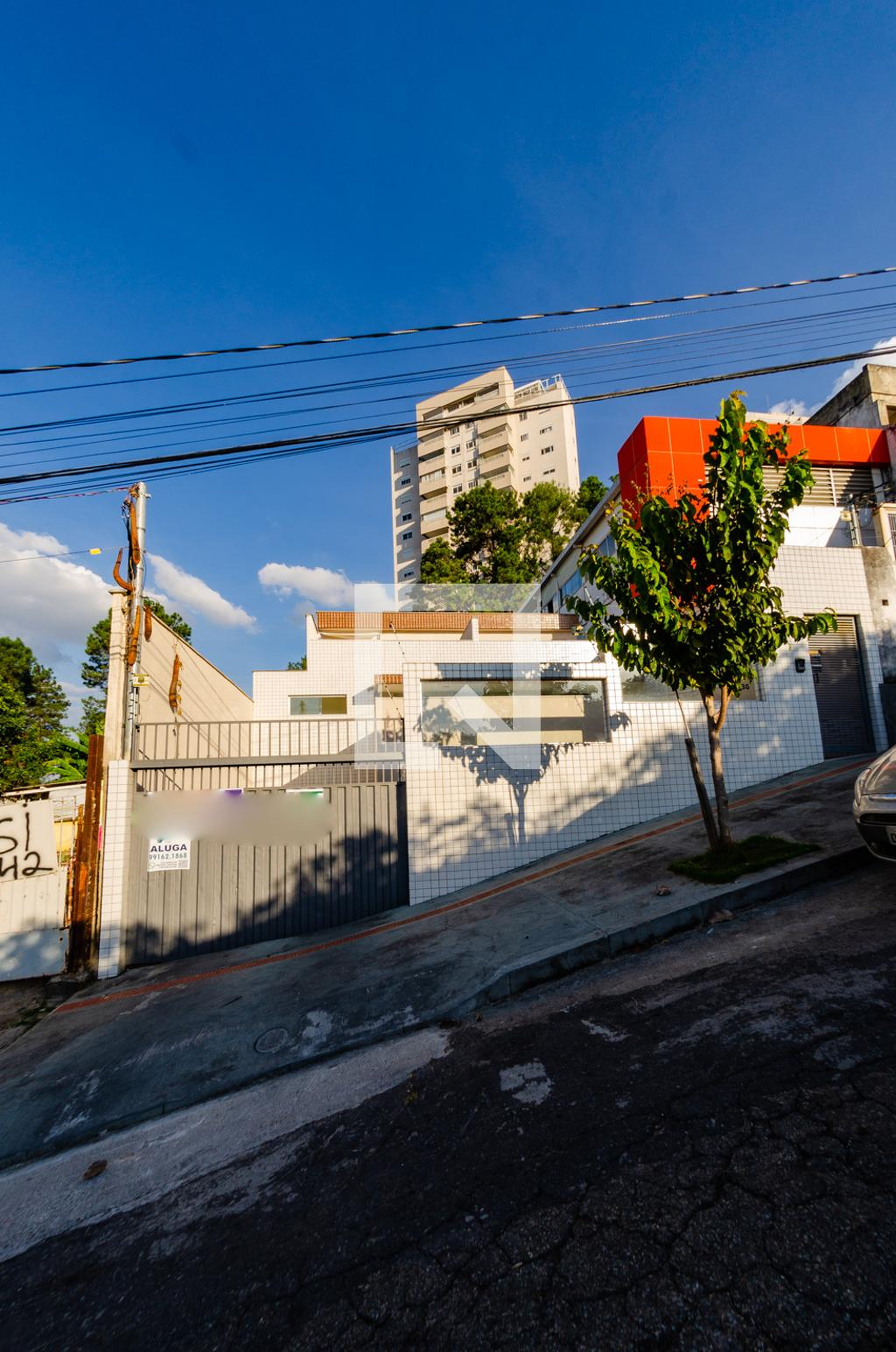Fachada Condomínio em Rua Psi, 230