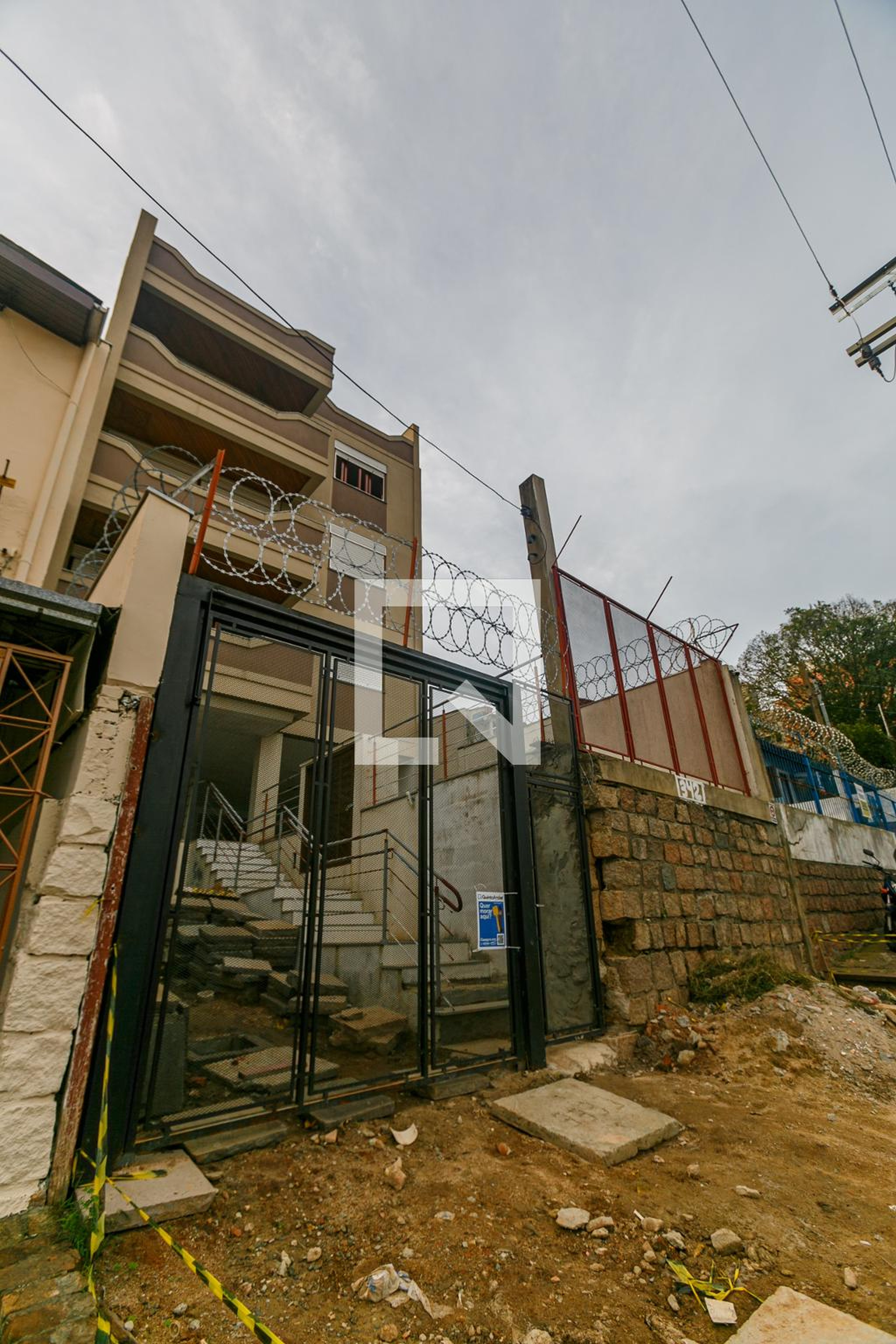 Fachada Condomínio em Rua Oscar Schneider, 432