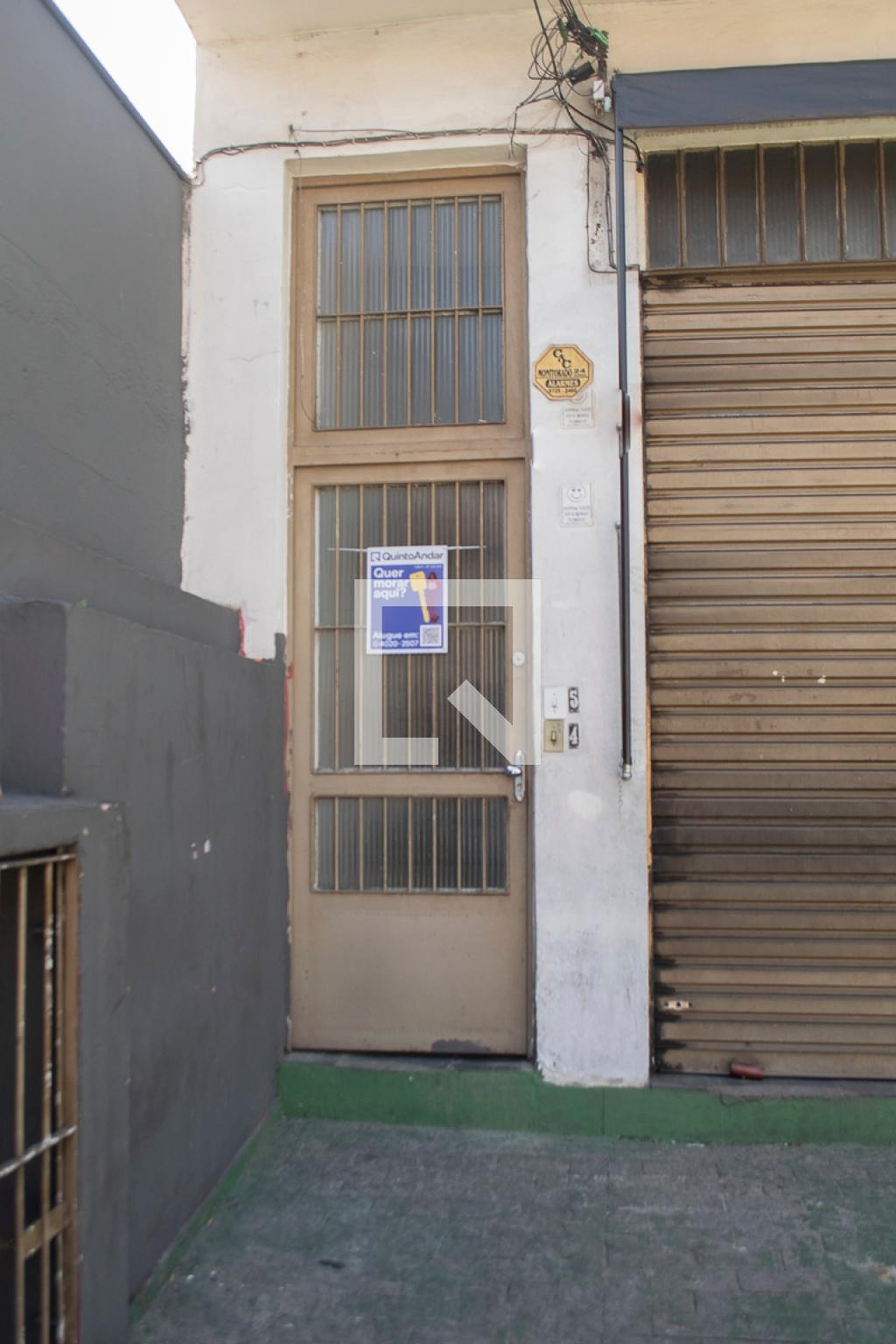 Fachada Condomínio em Rua Quartim Barbosa, 404