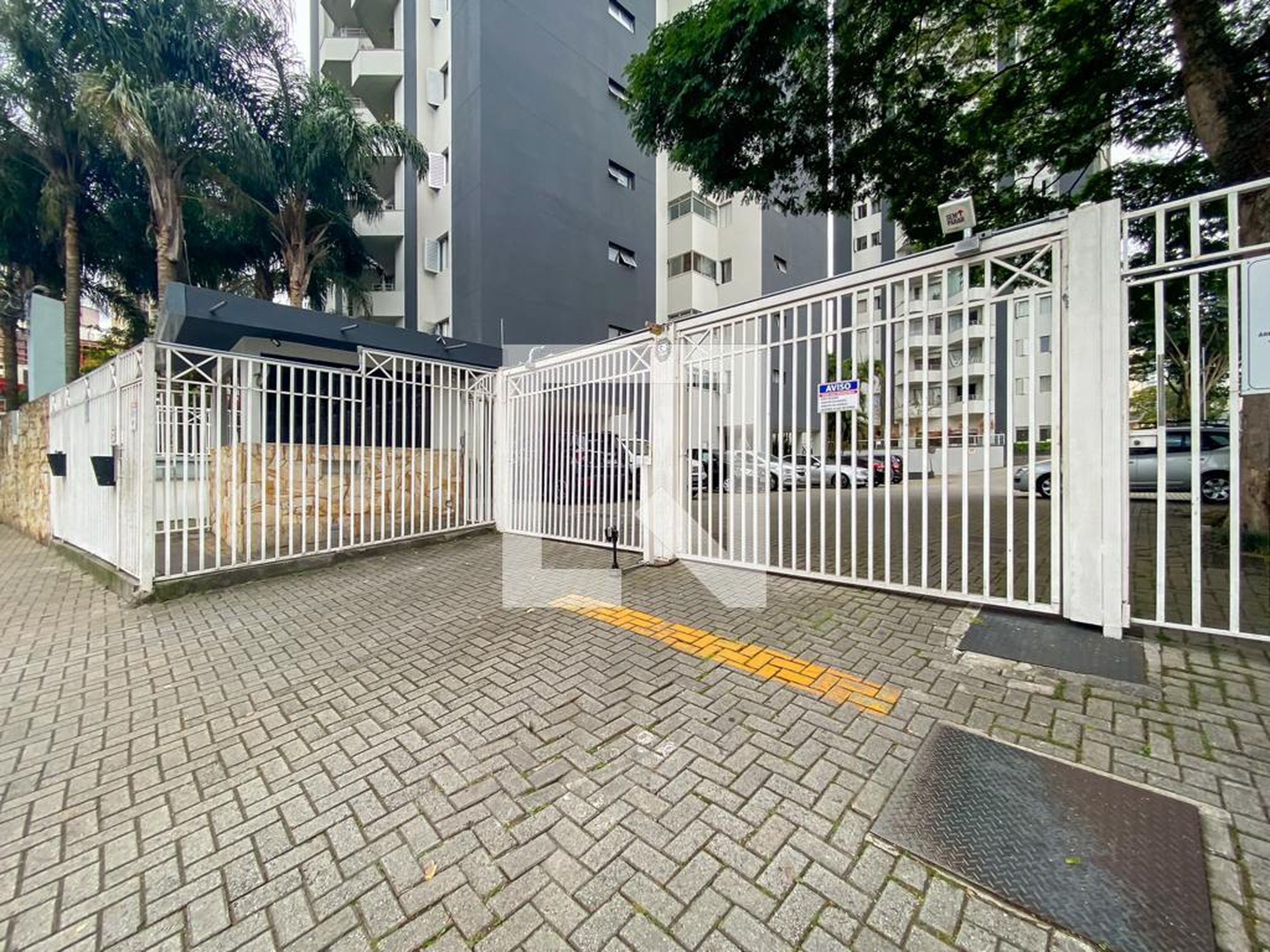 Fachada do Condomínio Condomínio Portal da Chácara Flora