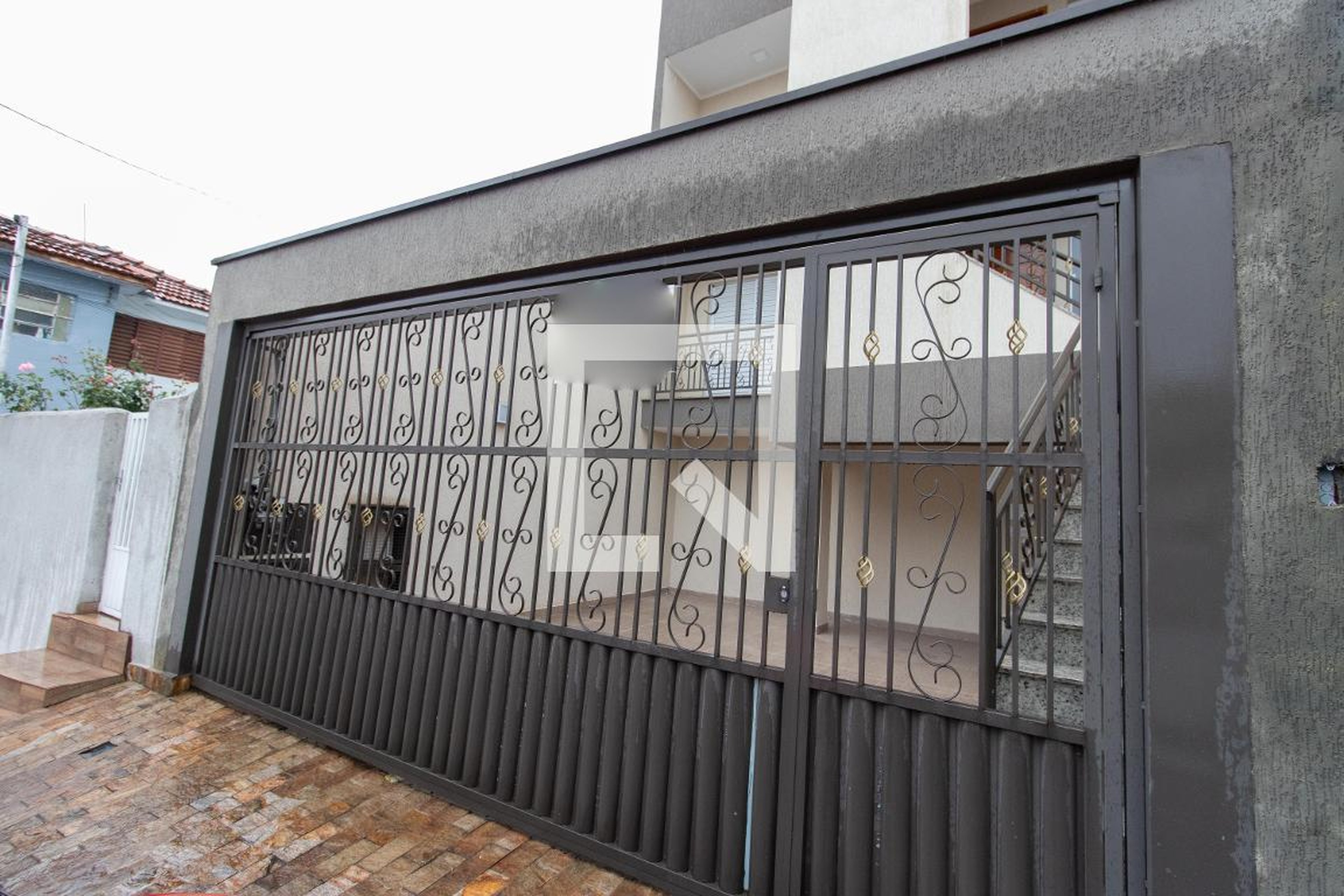 Fachada Condomínio em Rua Cangas, 8