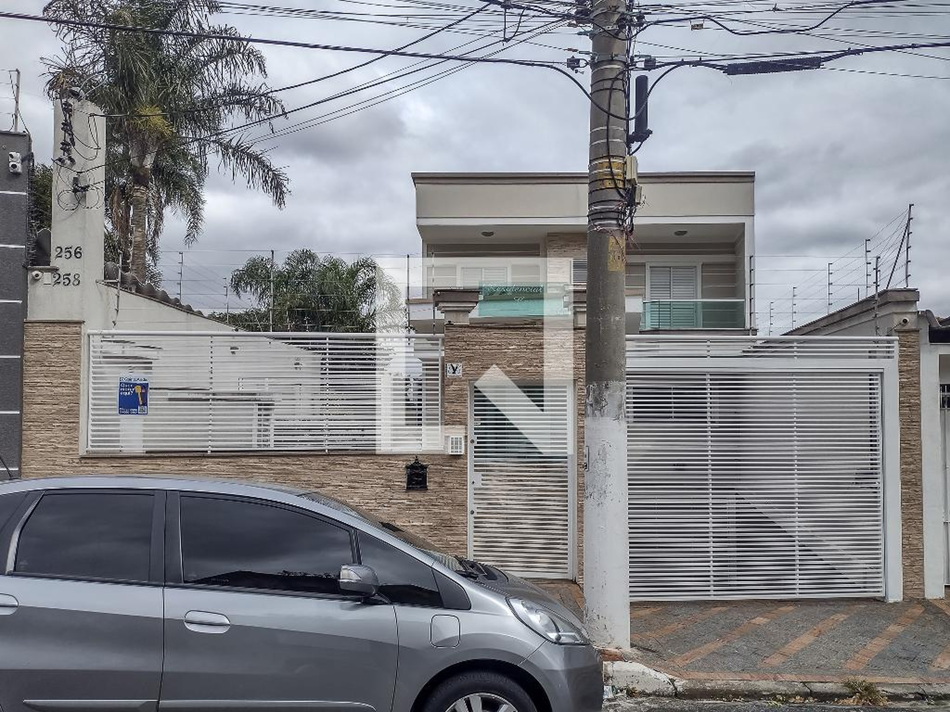 Fachada Condomínio em Rua Caçador, 256