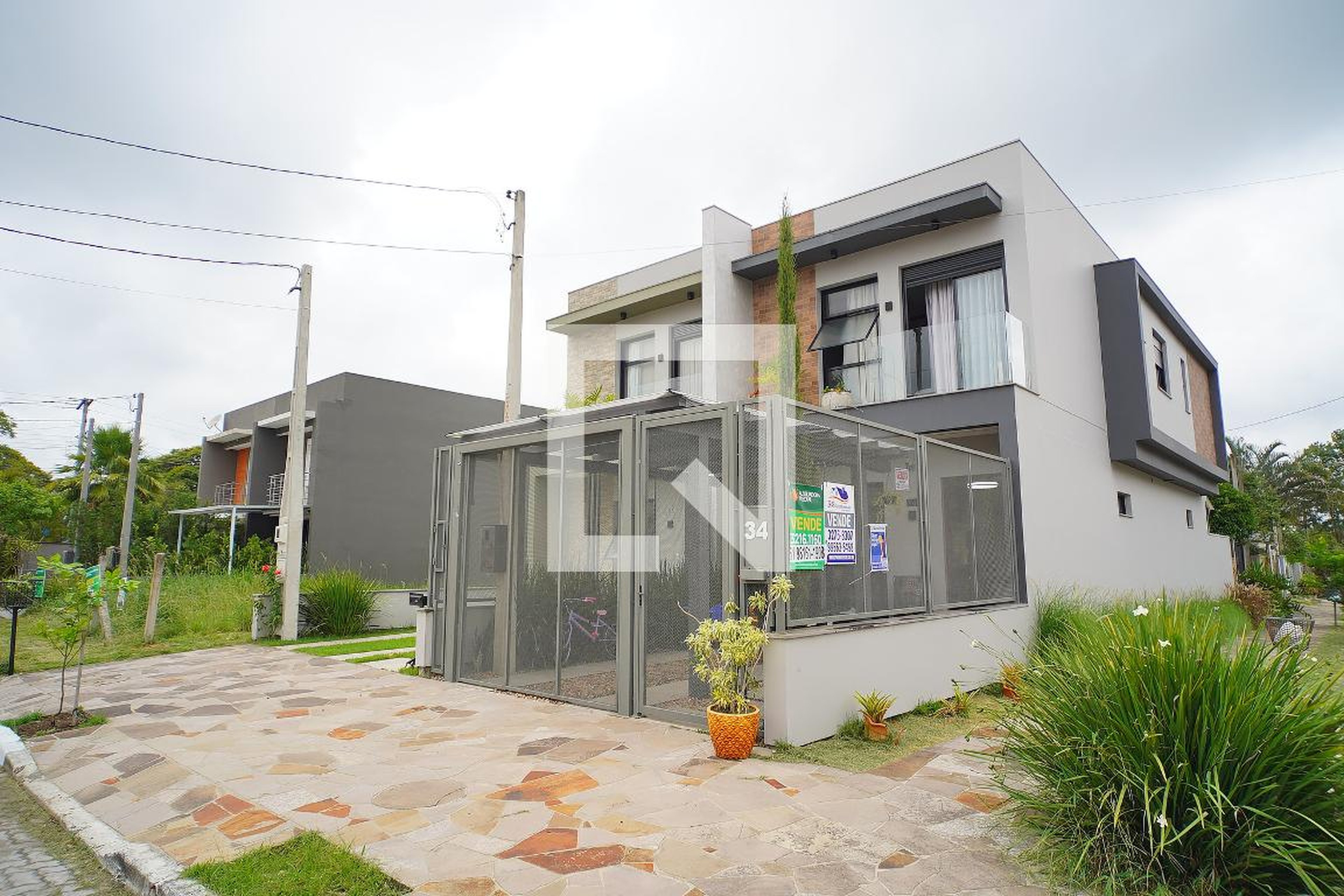 Fachada Condomínio em Rua Embira, 34
