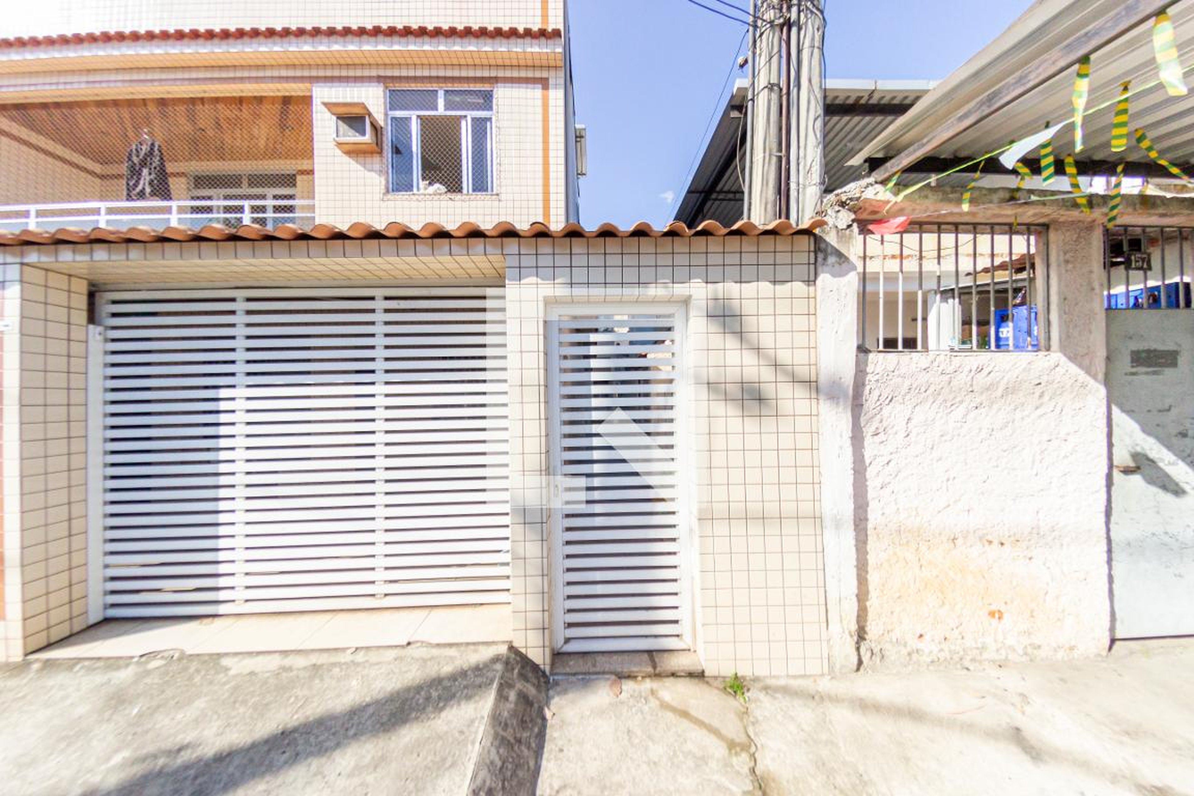 Fachada Condomínio em Rua Jucari, 155