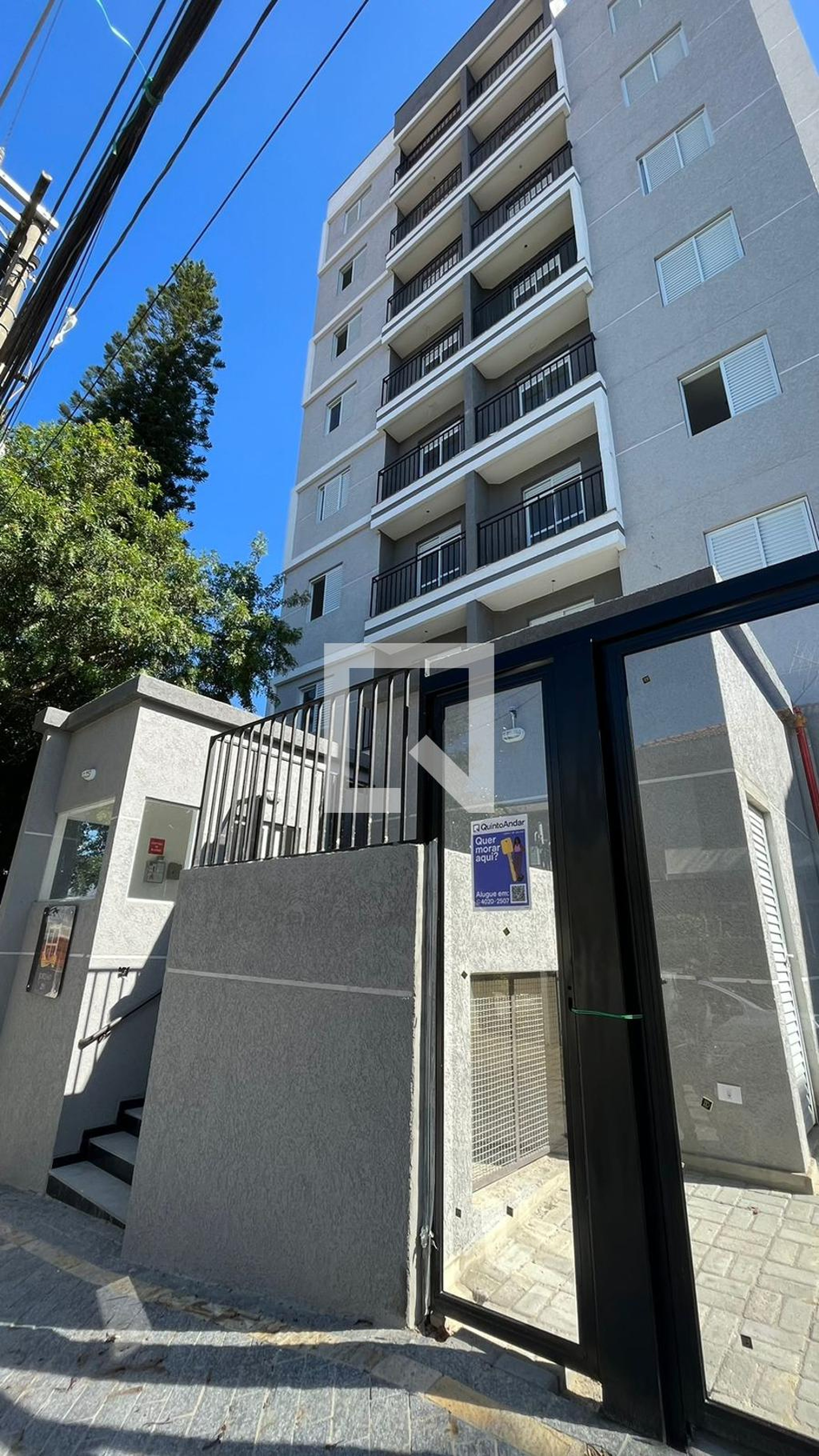 Fachada Condomínio em Rua Amoroso Costa, 5