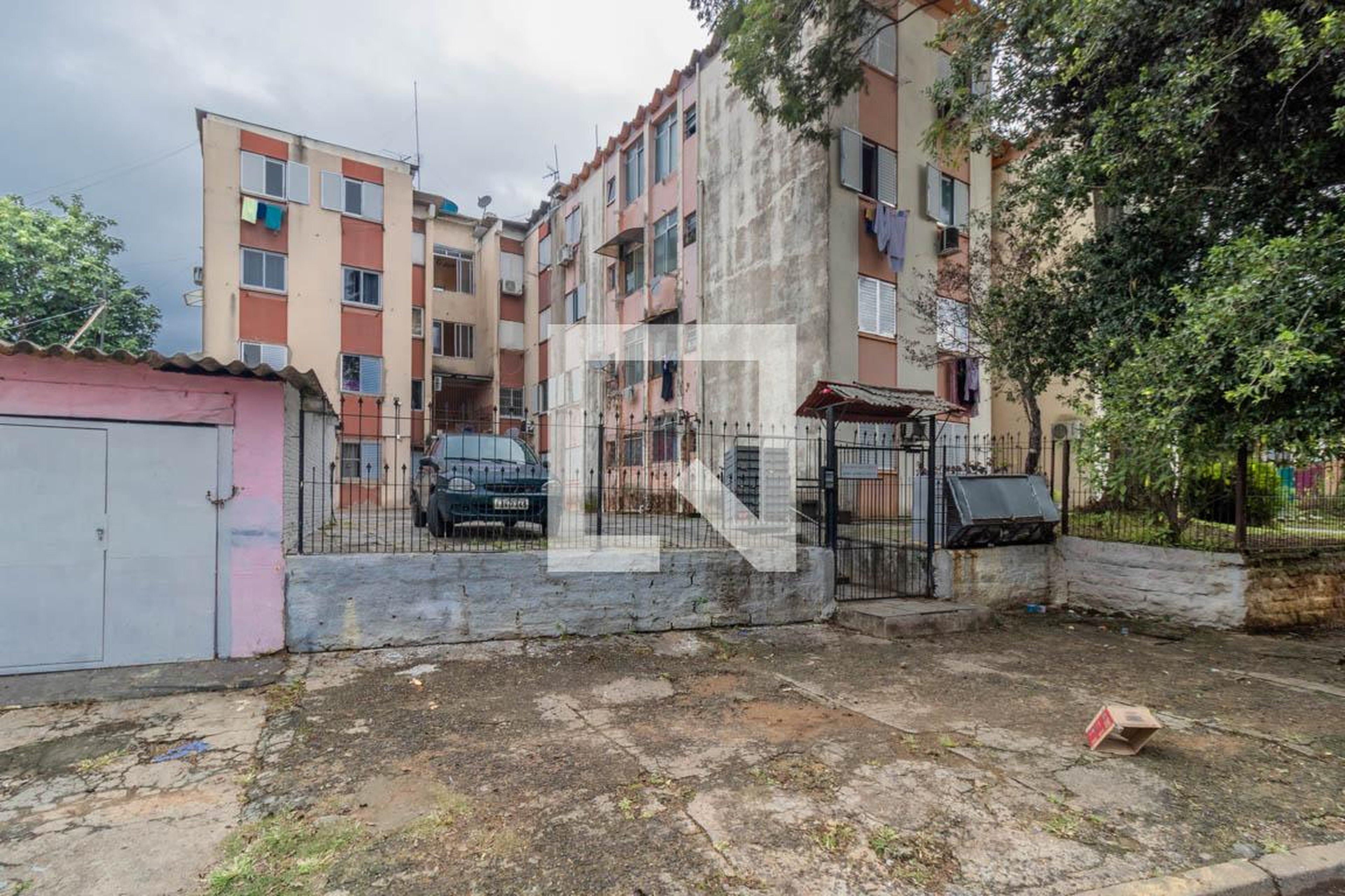 Fachada do condomínio Condomínio em Rua Tt, 6