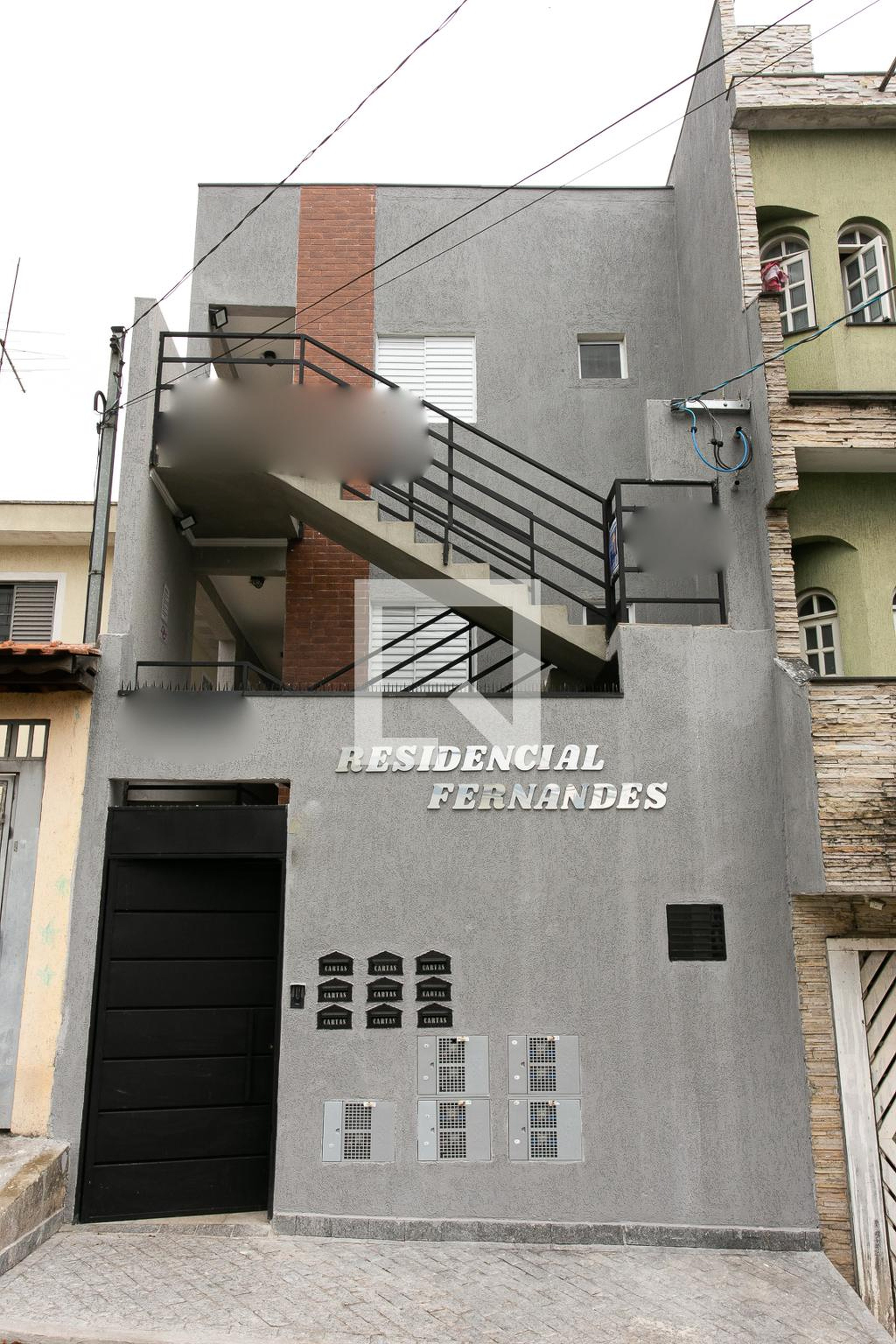 Fachada Condomínio em Rua Henrique Schurig, 460