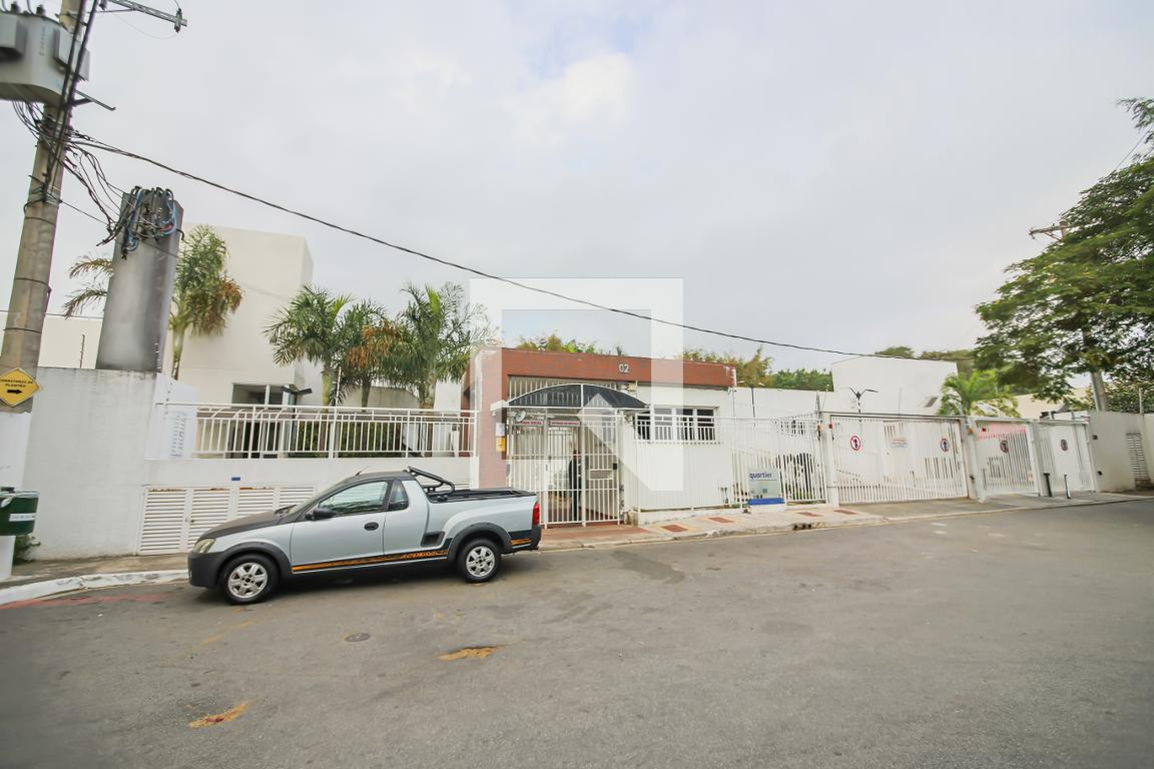 Fachada do Condomínio Condomínio Quartier Residence