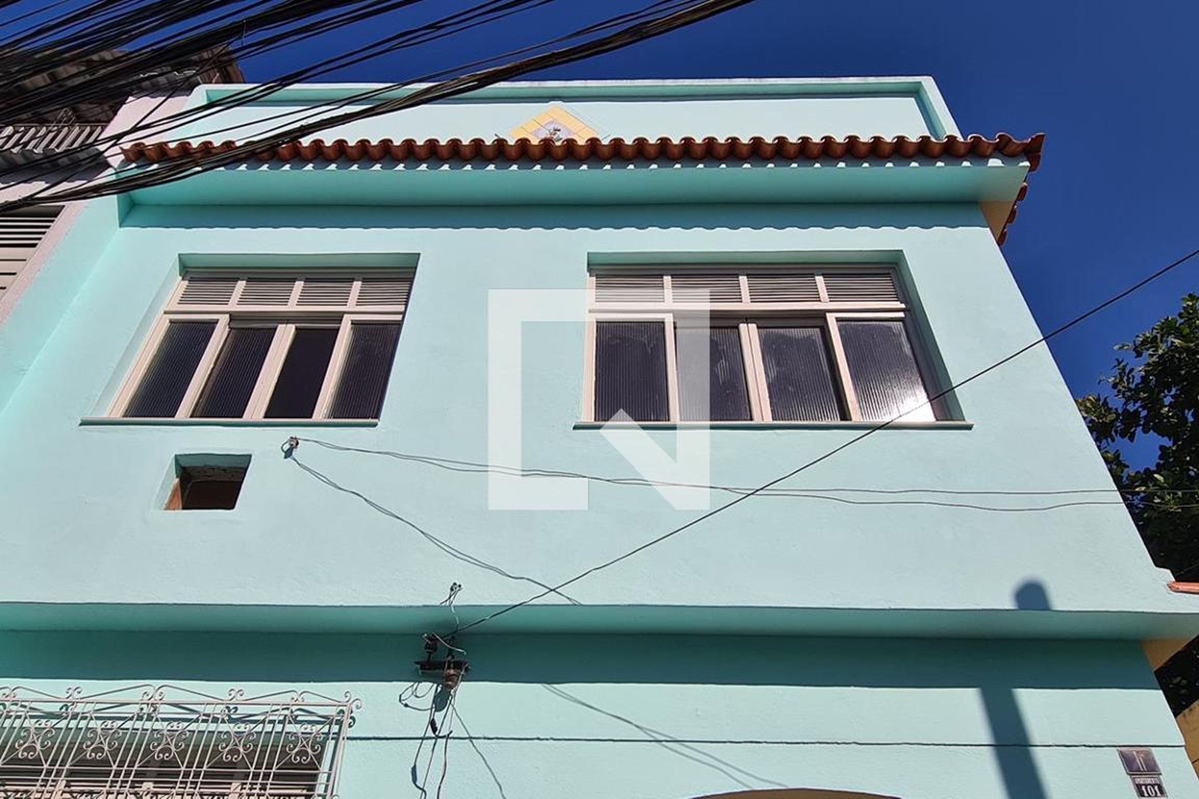 Fachada Condomínio em Rua Mendes de Aguiar, 122