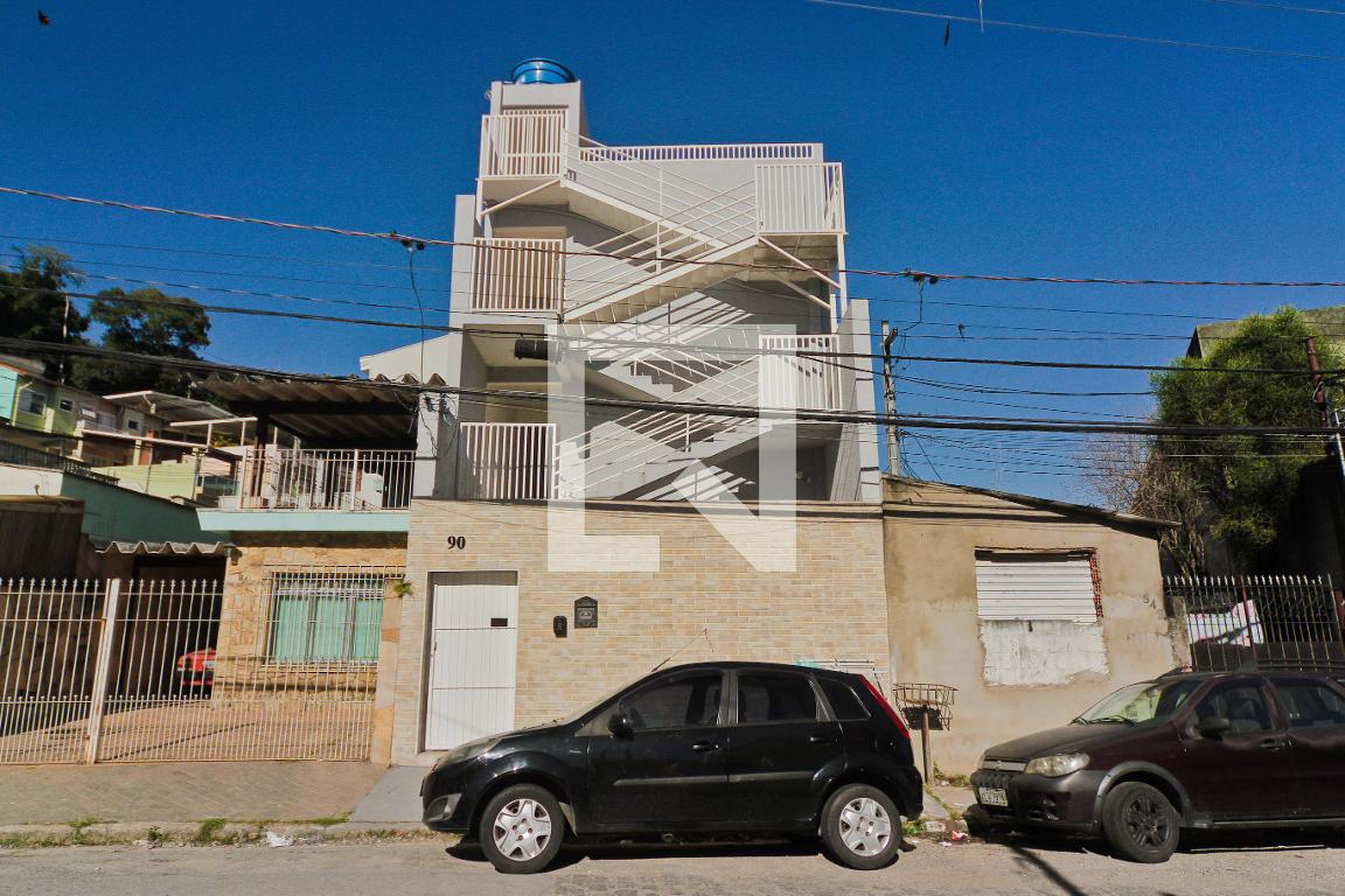 Fachada Condomínio em Rua Brigadeiro Godinho dos Santos, 90