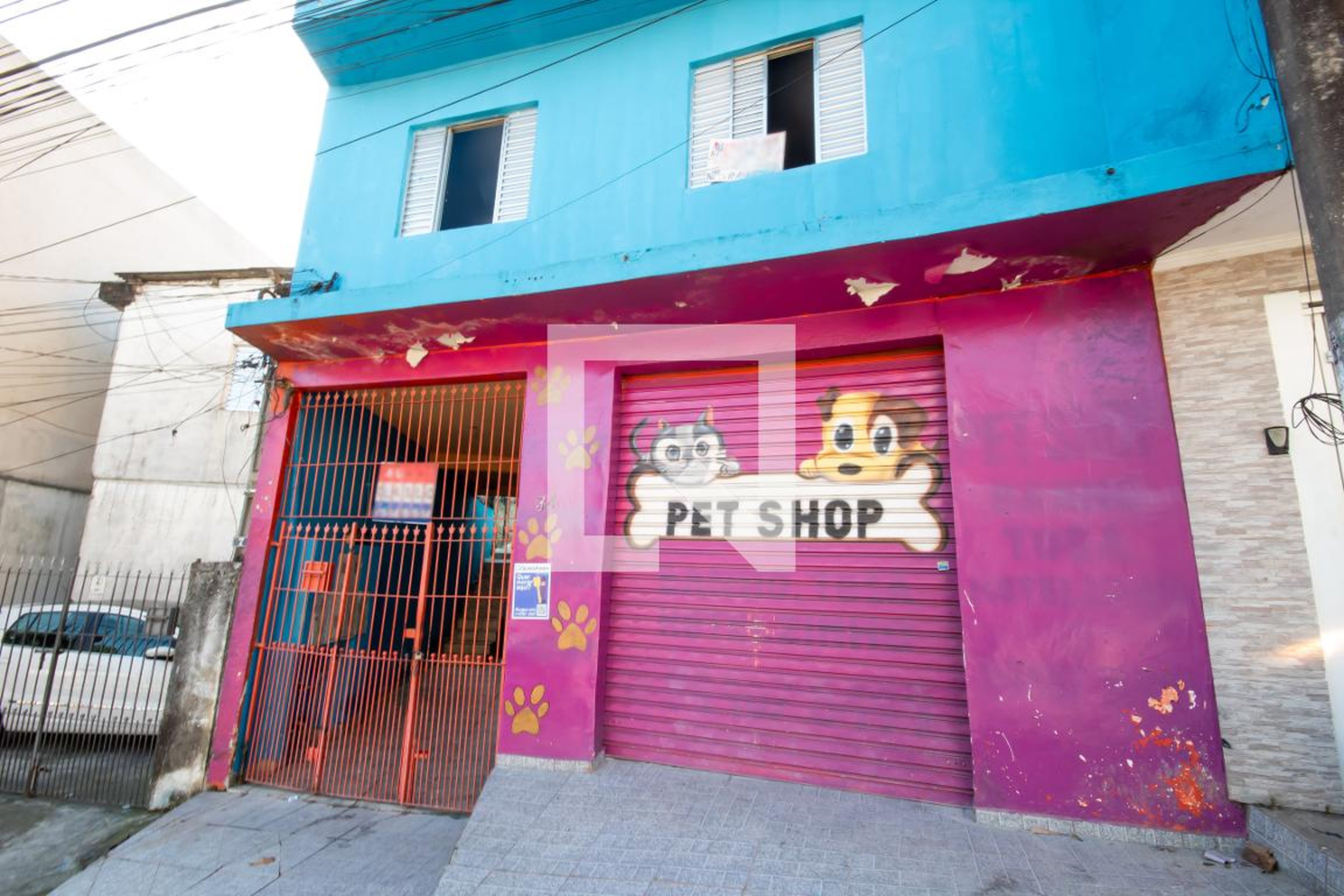 Fachada Condomínio em Rua Domingos Santi, 34