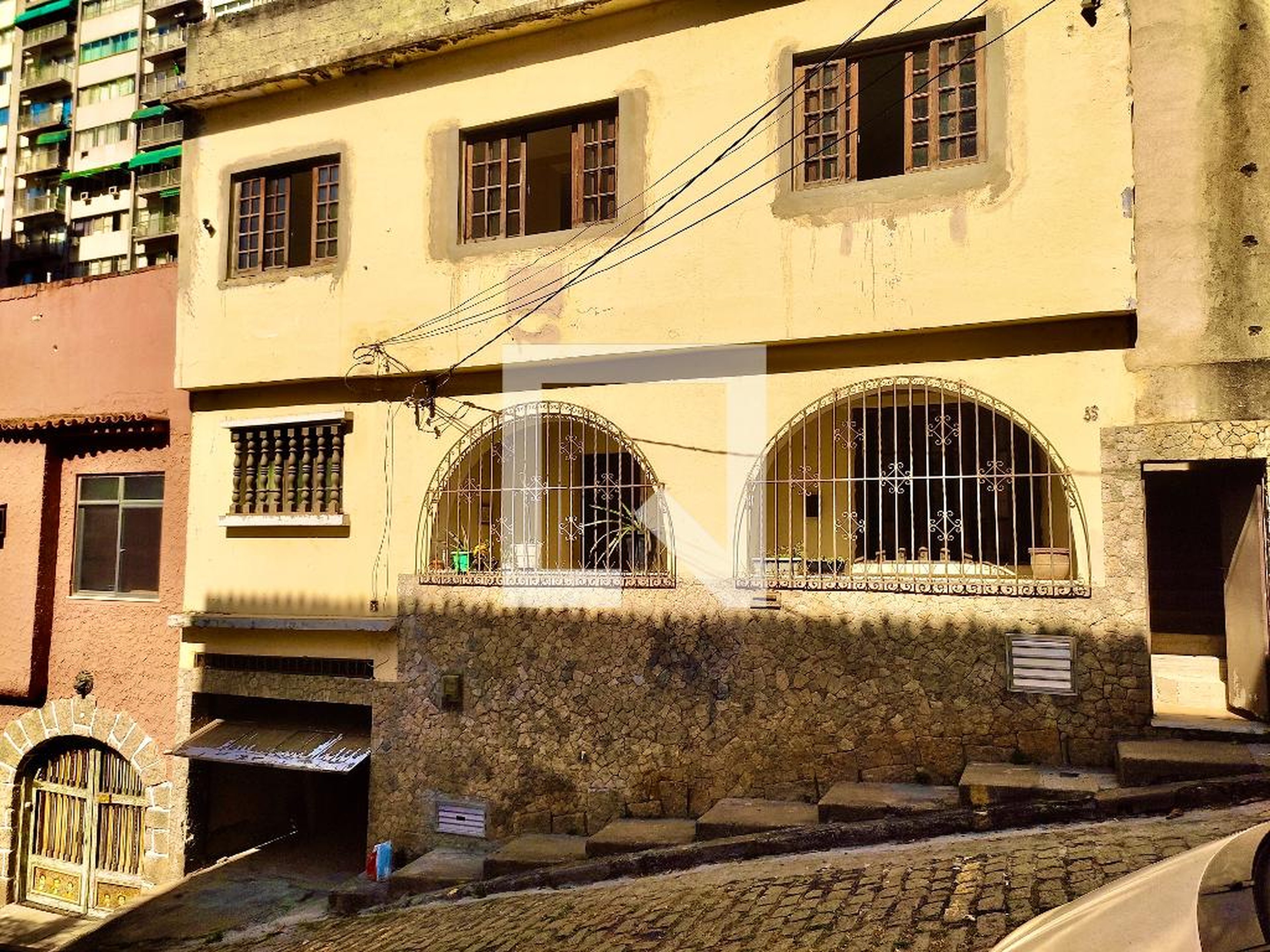 Fachada Condomínio em Rua Emílio Berla, 85