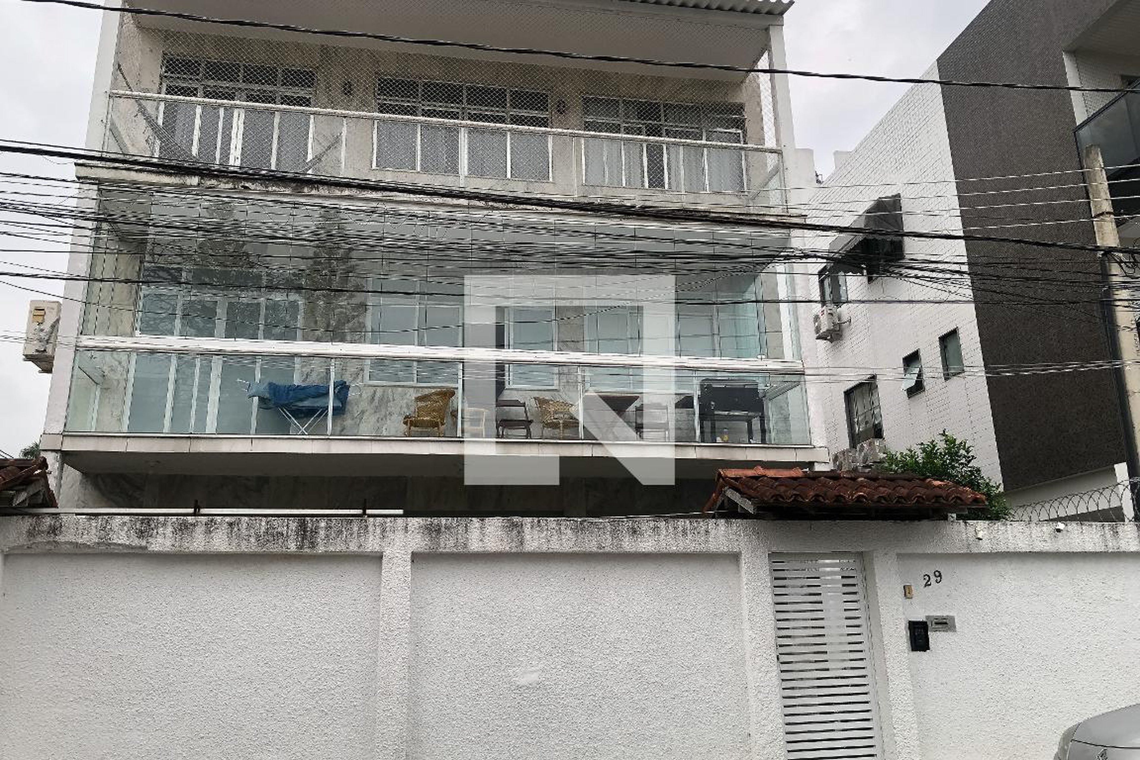 Fachada Condomínio em Rua Henrique Barbosa de Amorim, 29