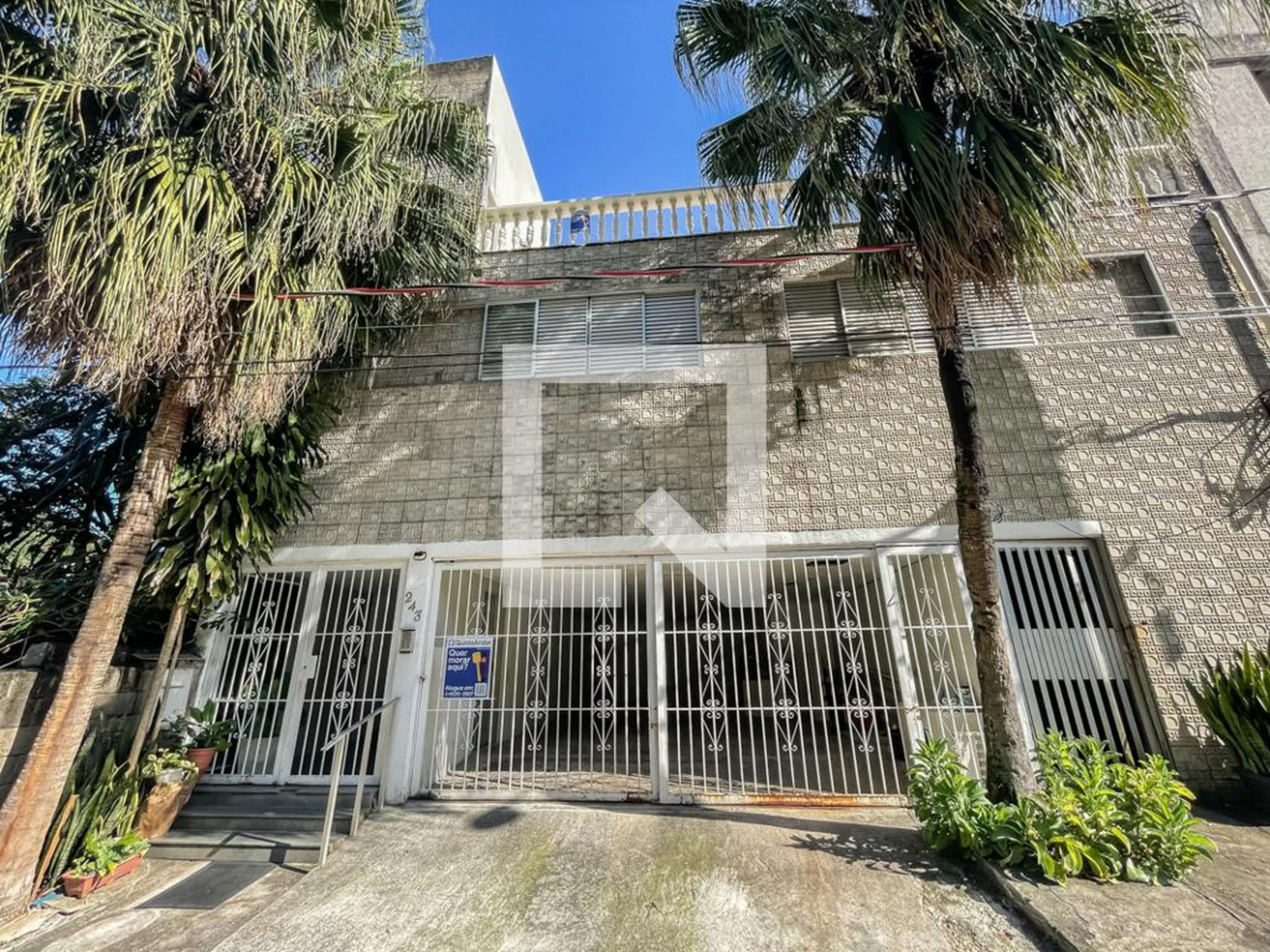 Fachada Condomínio em Rua Olegário Mariano, 243