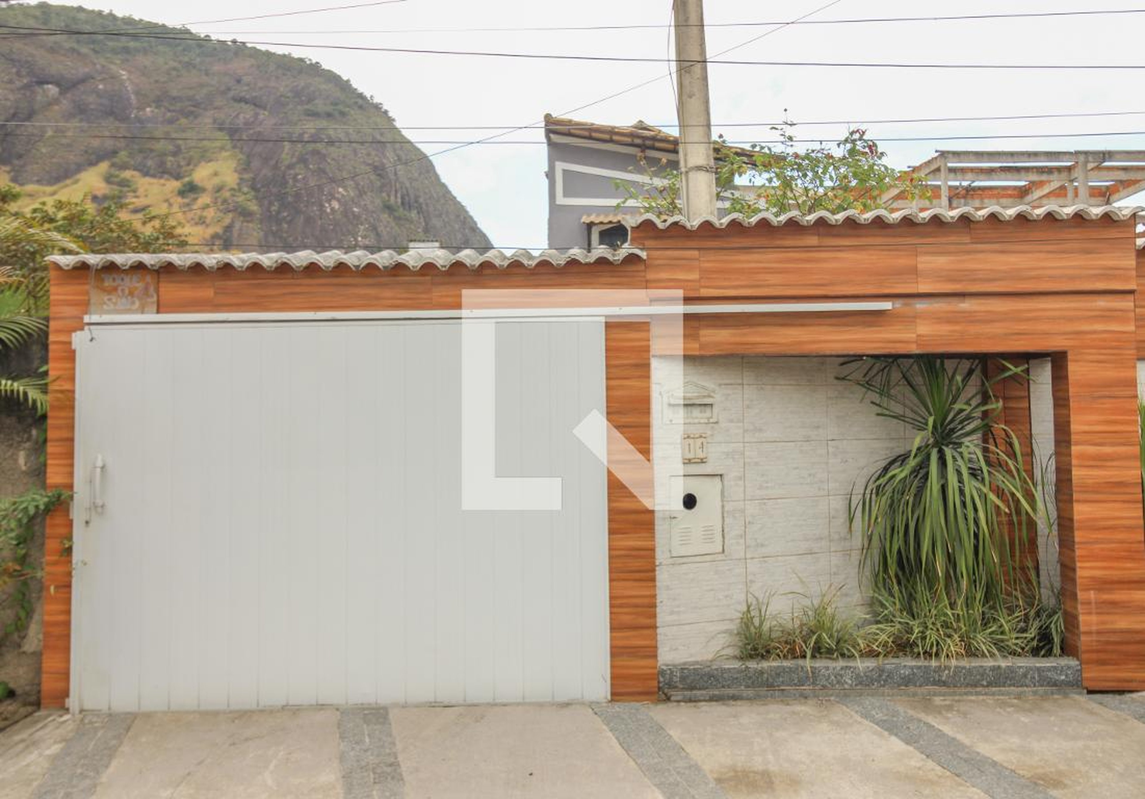 Fachada Condomínio em Rua Pedra Calembá, 14a