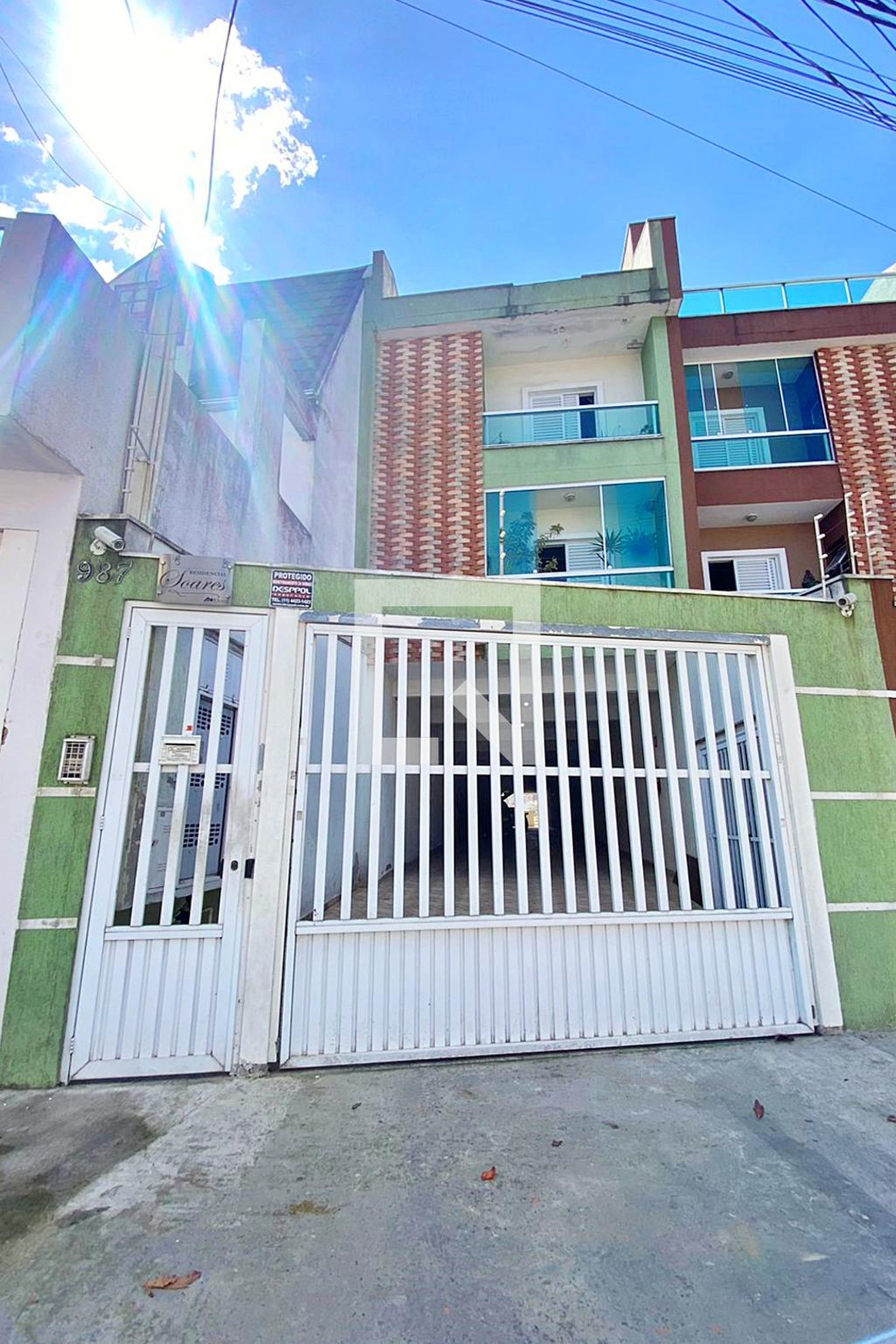 Fachada Condomínio em Rua Aimbere, 987