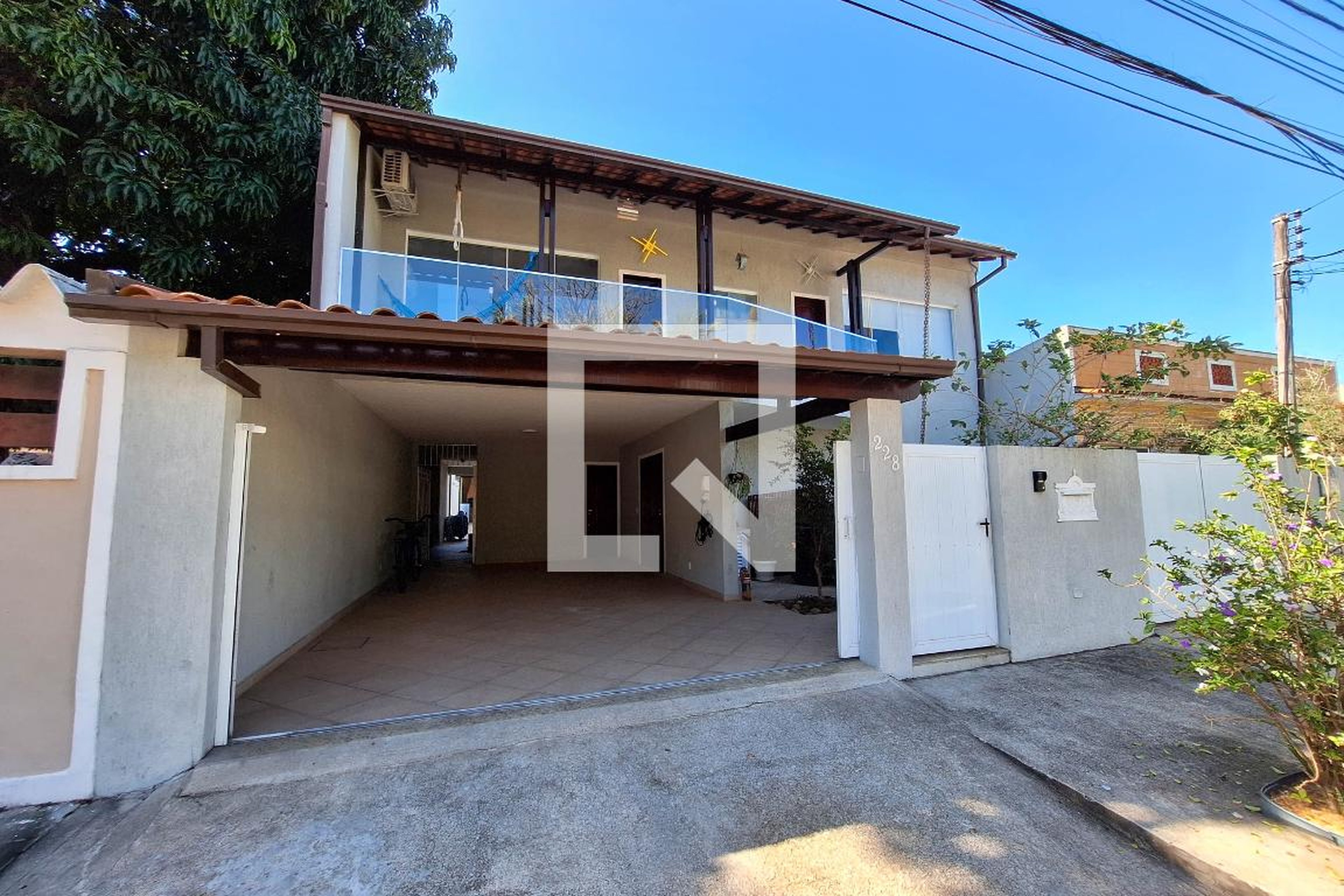 Fachada Condomínio em Rua Sibipirunas, 228