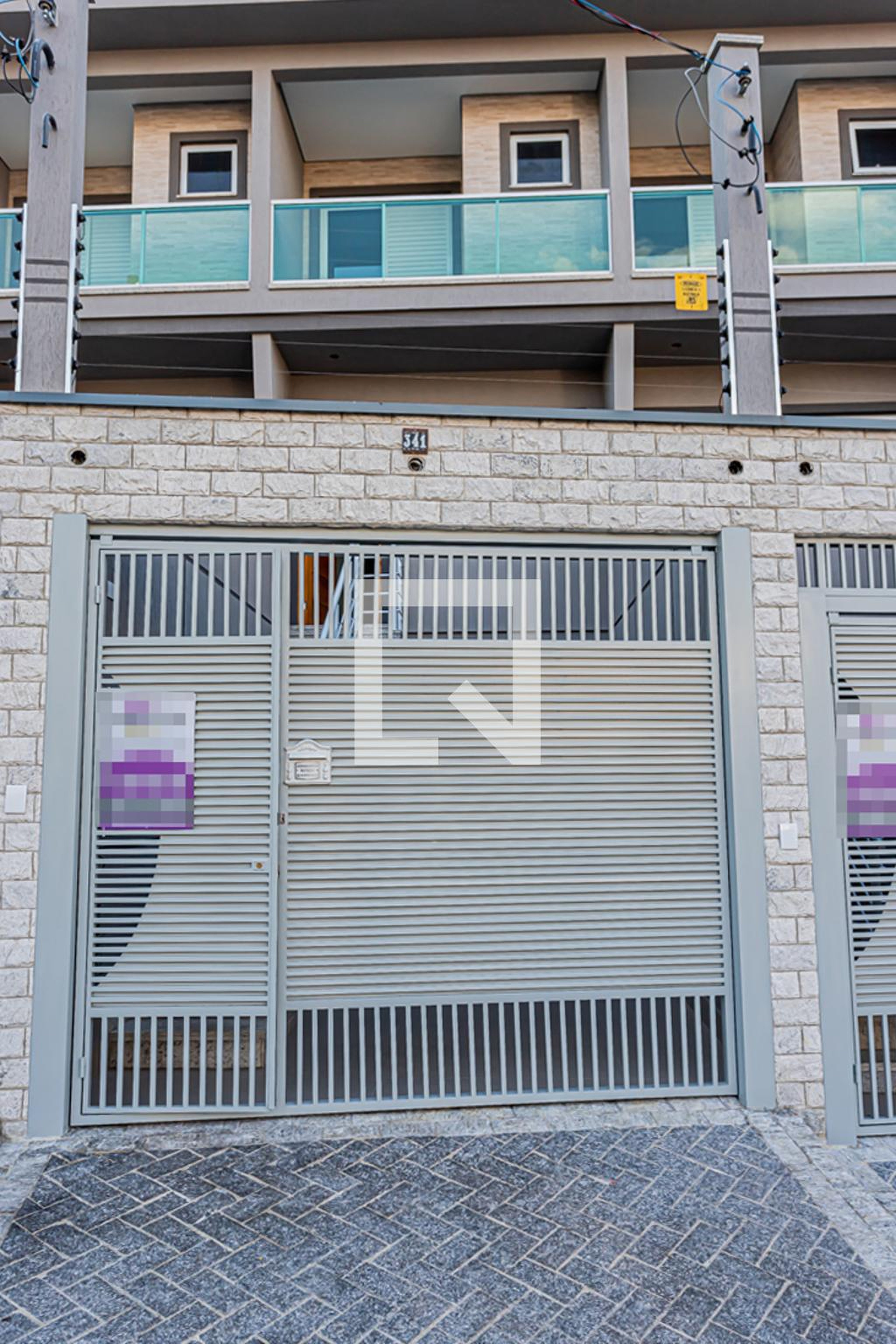 Fachada Condomínio em Rua Pedro Marigliani, 349