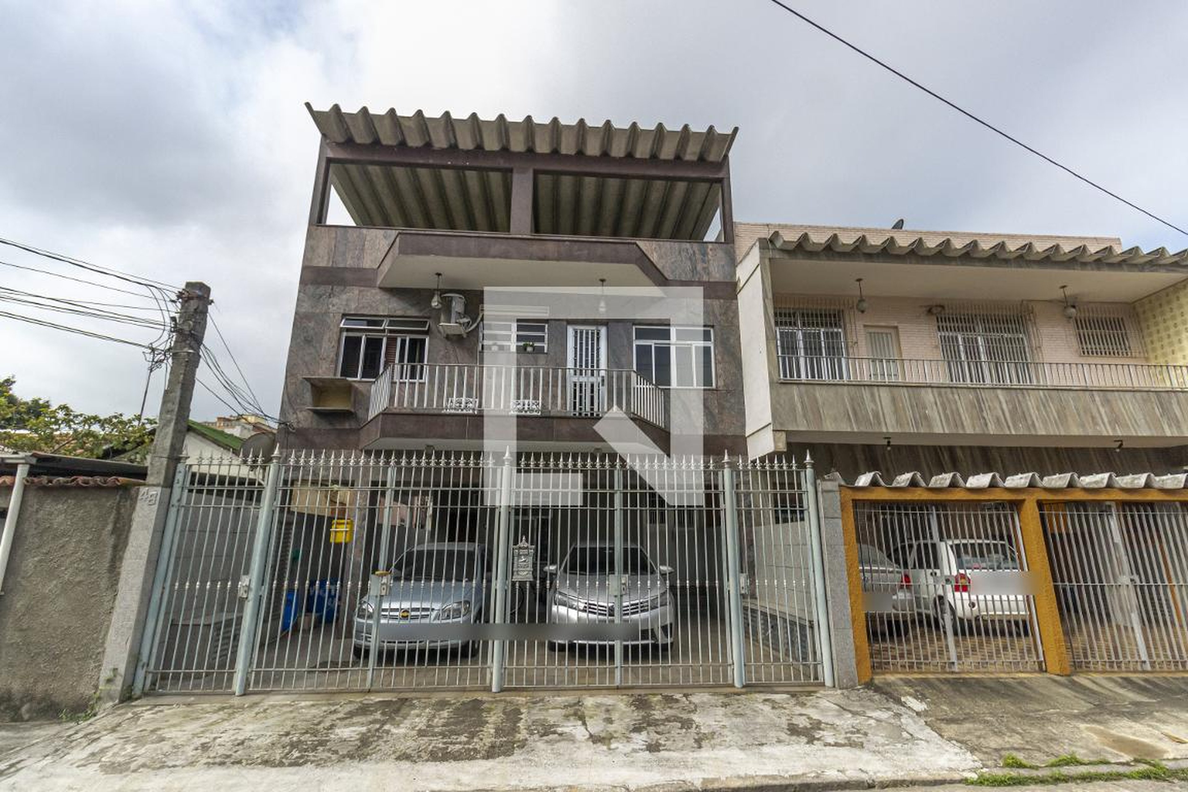 Fachada Condomínio em Rua Corintia, 48