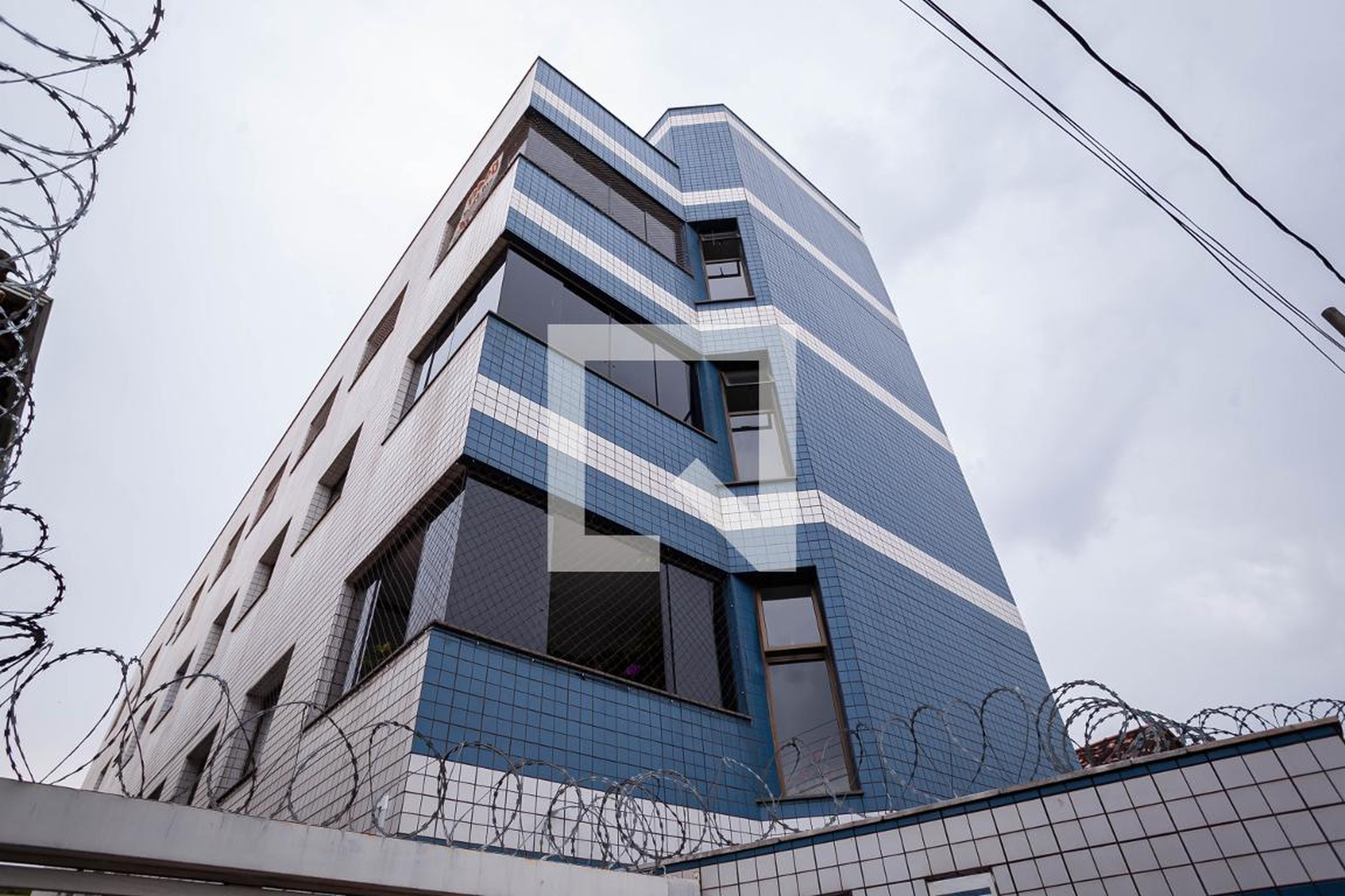 Fachada Condomínio em Rua Homero de Oliveira, 85