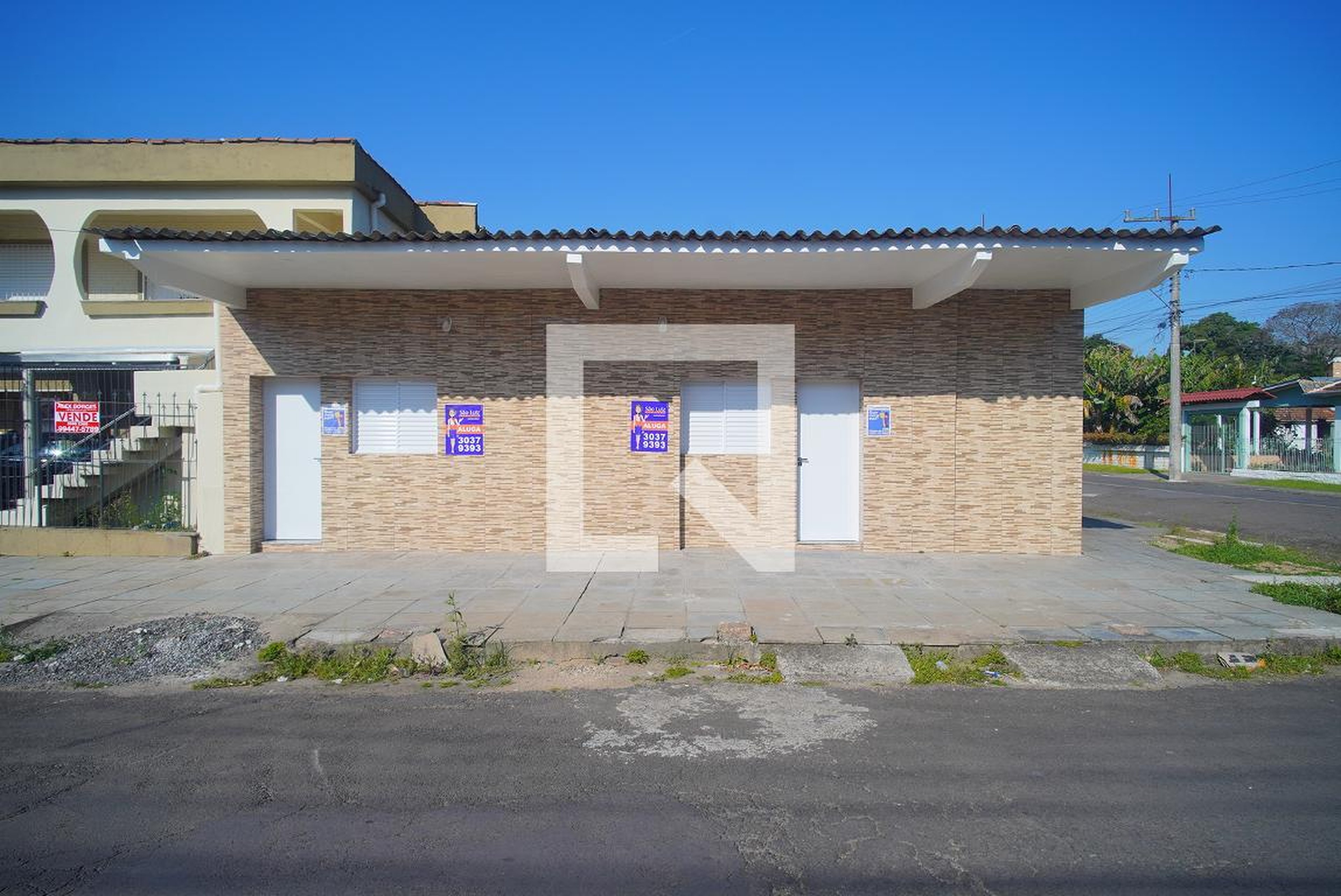 Fachada Condomínio em Rua Andrade Neves, 207