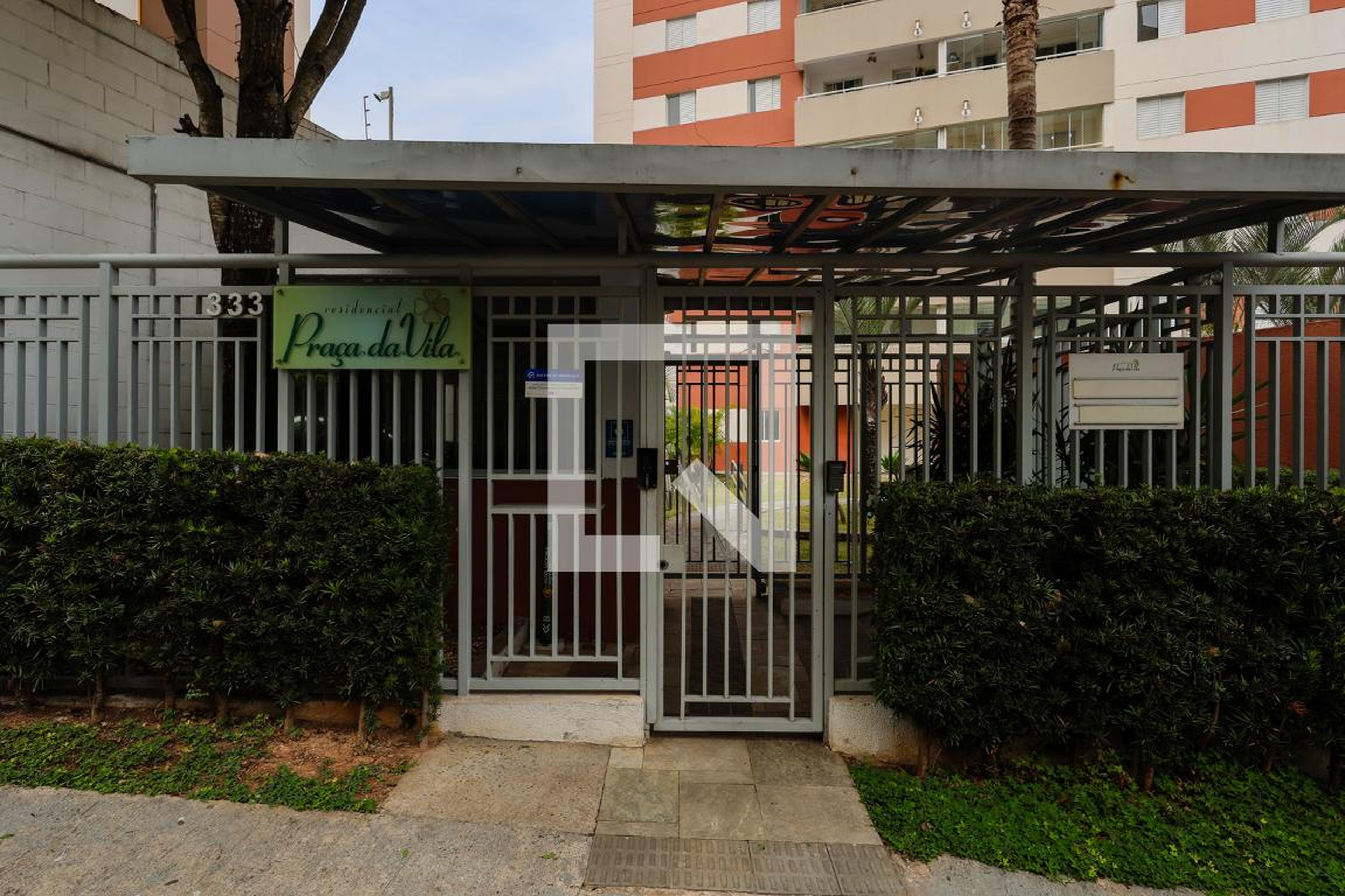 Fachada do condomínio Condomínio Praça da Vila