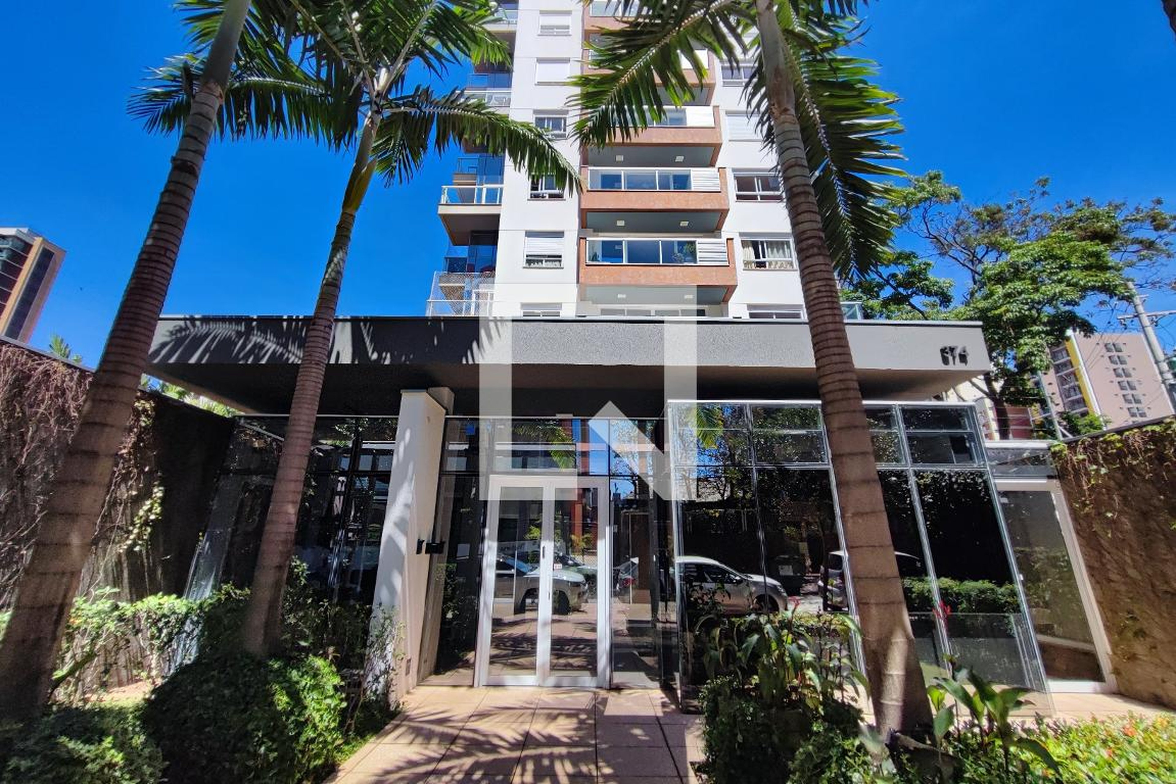 Fachada do Condomínio Condomínio Parigi