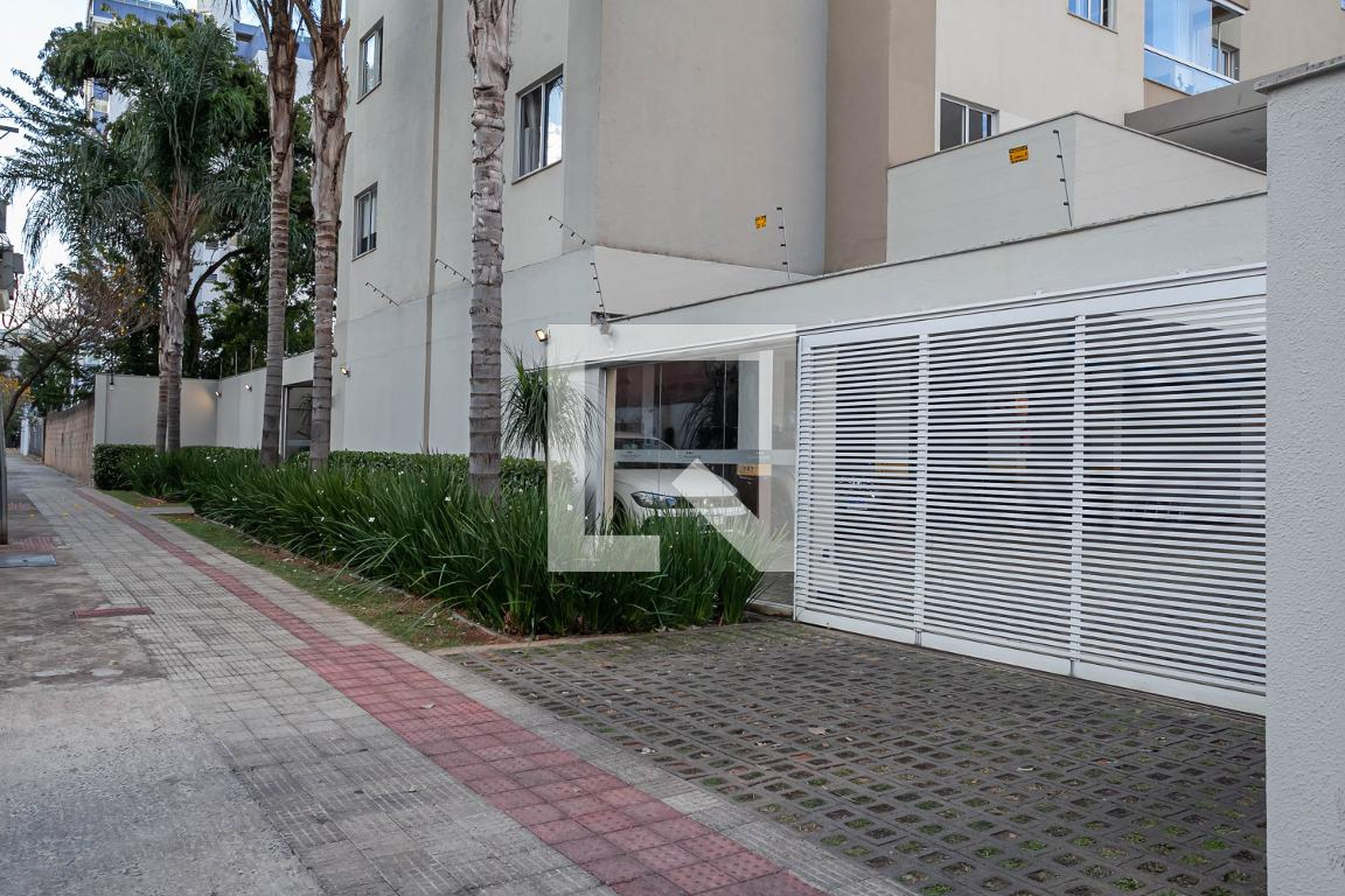 Fachada do Condomínio Condomínio Convivence Residence