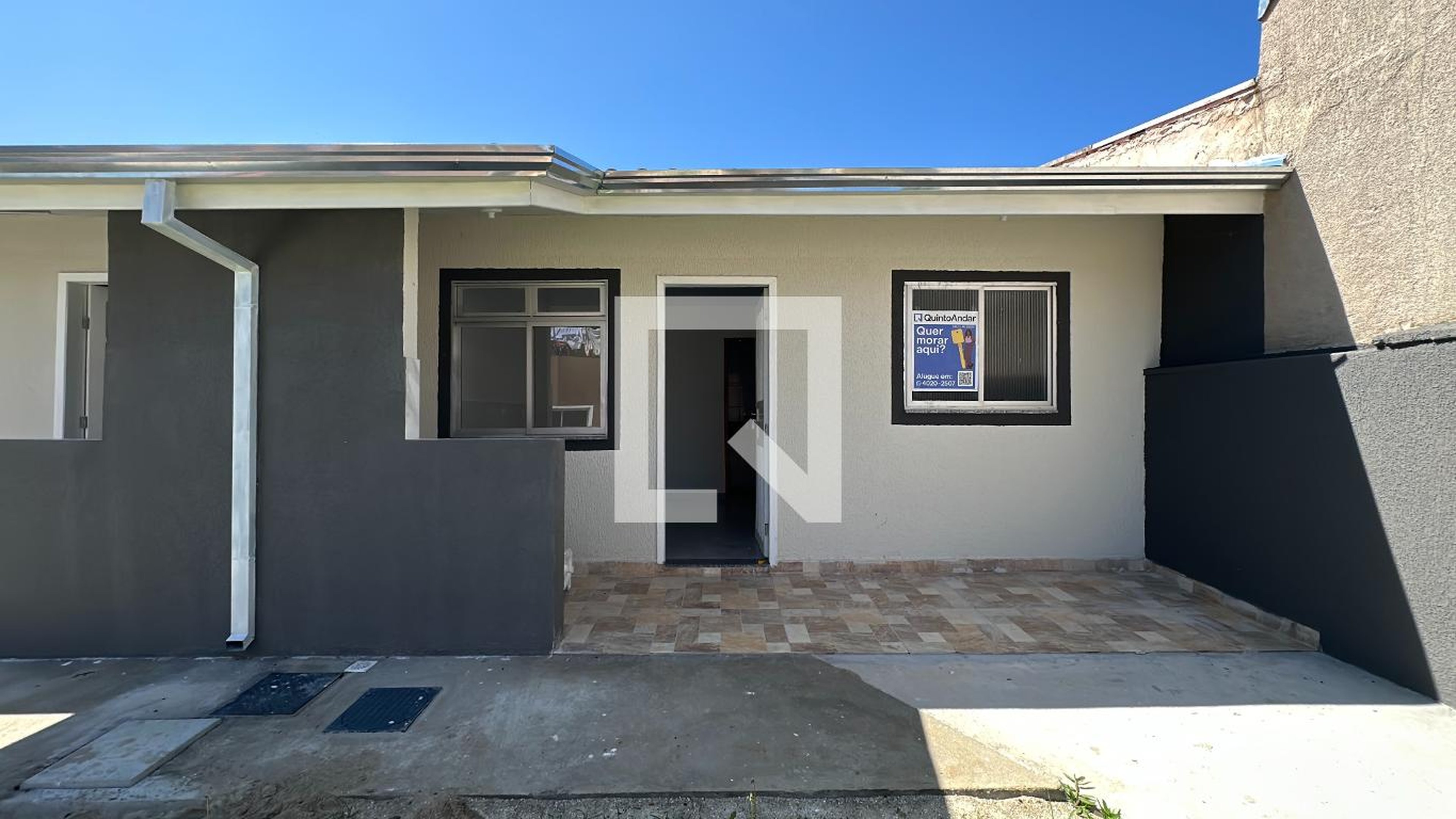 Fachada Condomínio em Rua Theophilo Mansur, 597