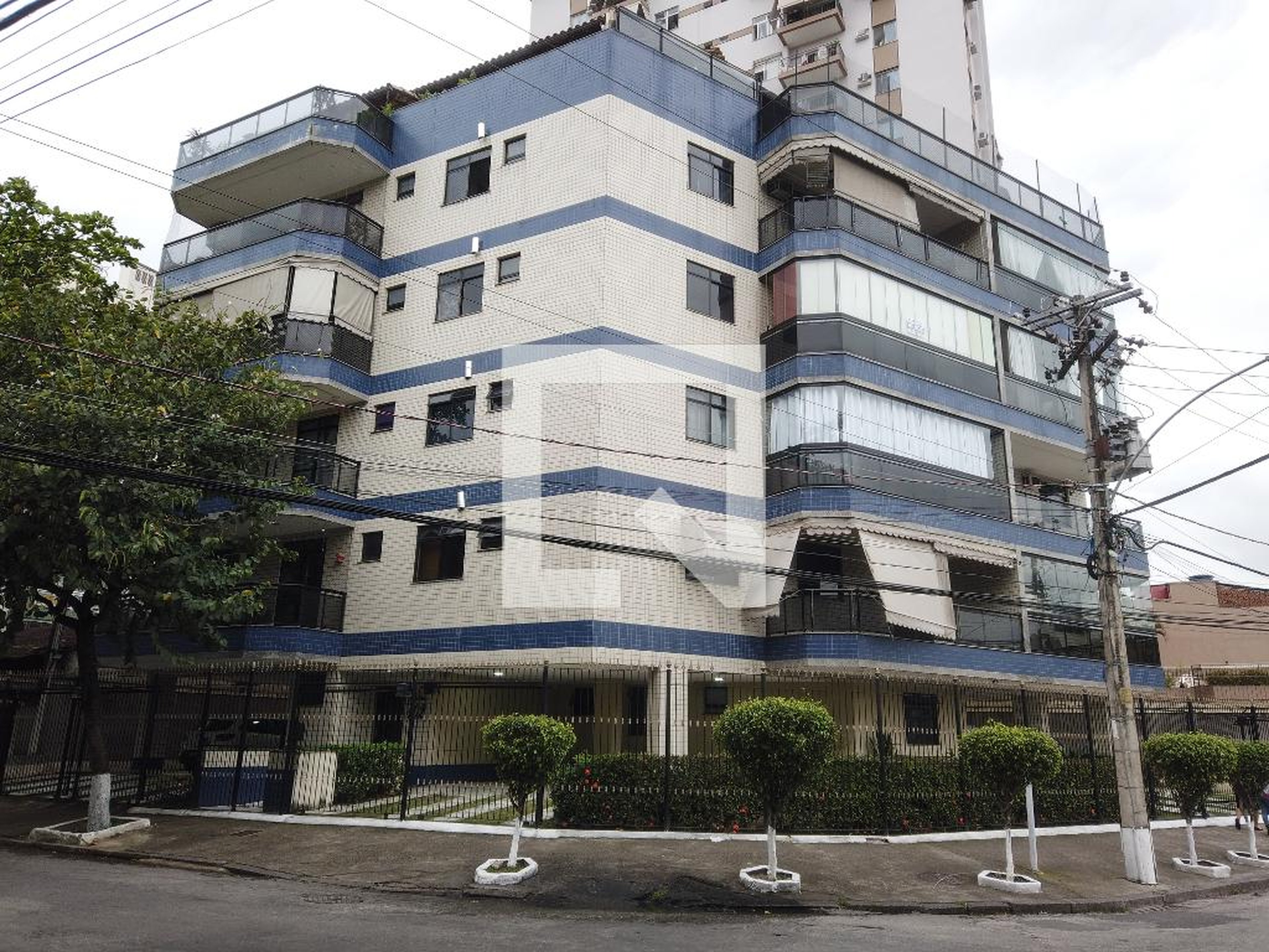 Fachada Condomínio em Rua Coronel Tedim, 102