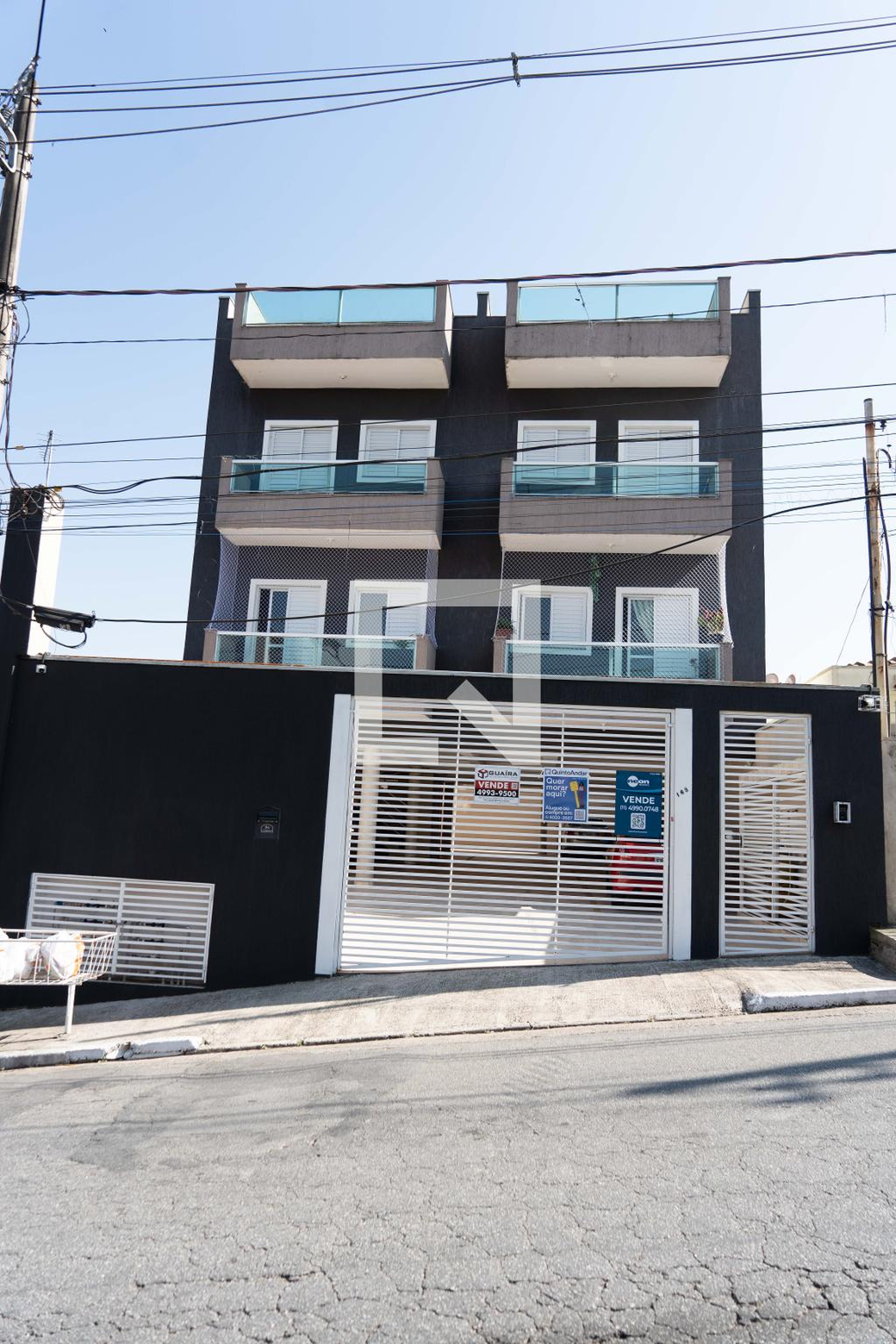 Fachada Condomínio em Rua Alfredo Pujol, 168