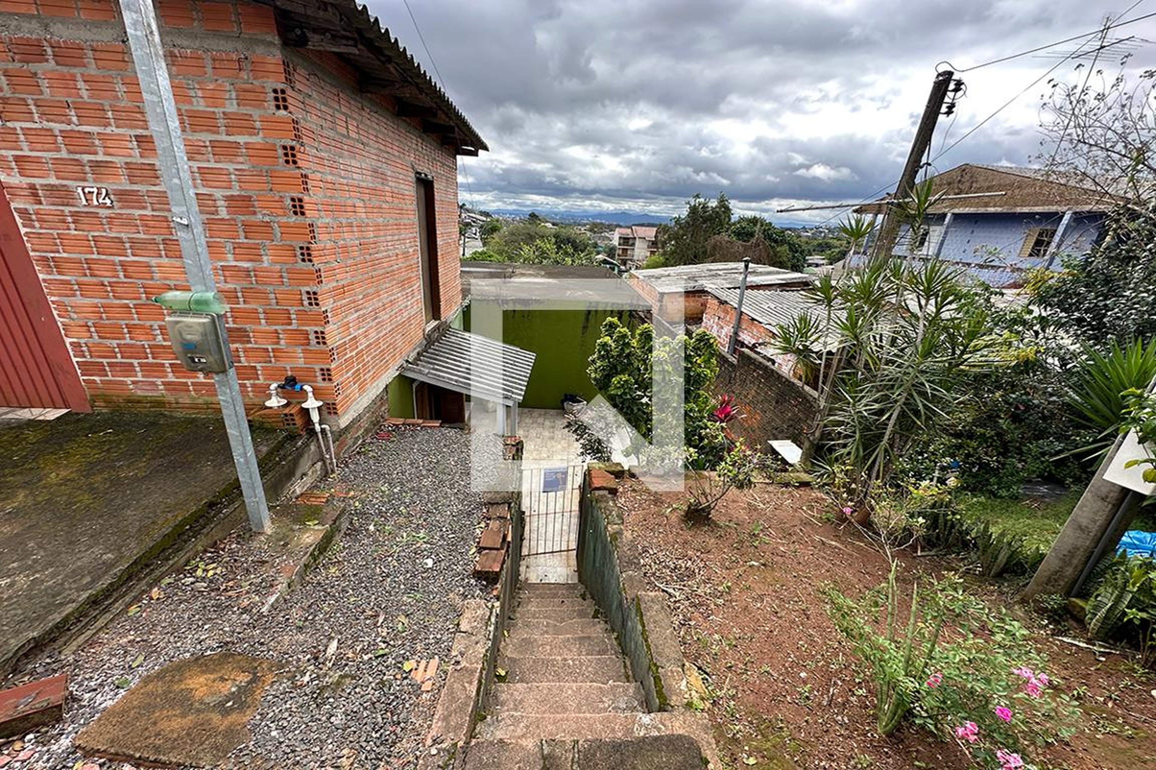 Fachada Condomínio em Rua Alberto Pasqualini, 174
