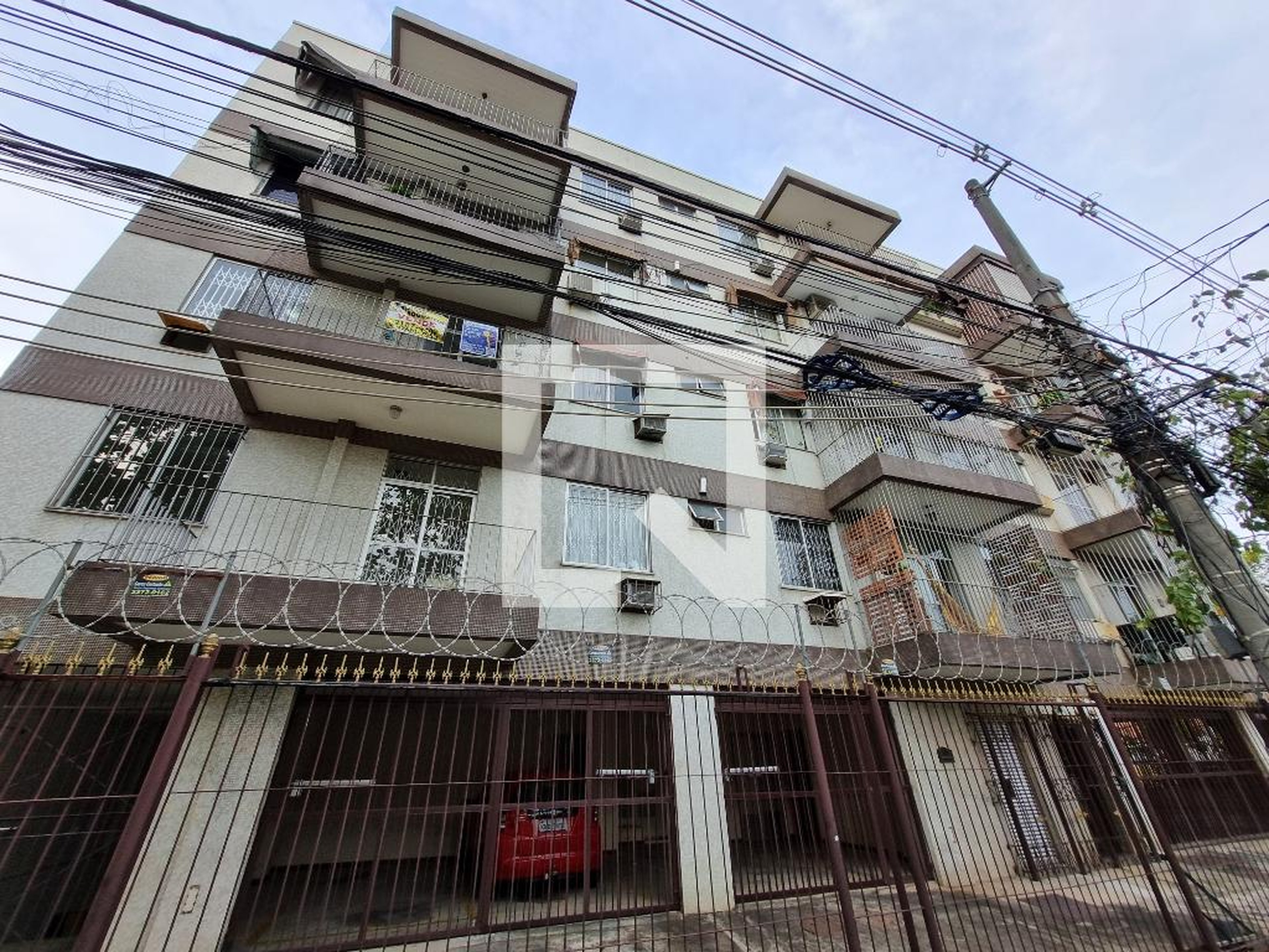 Fachada Condomínio em Rua Joaquina Rosa, 220