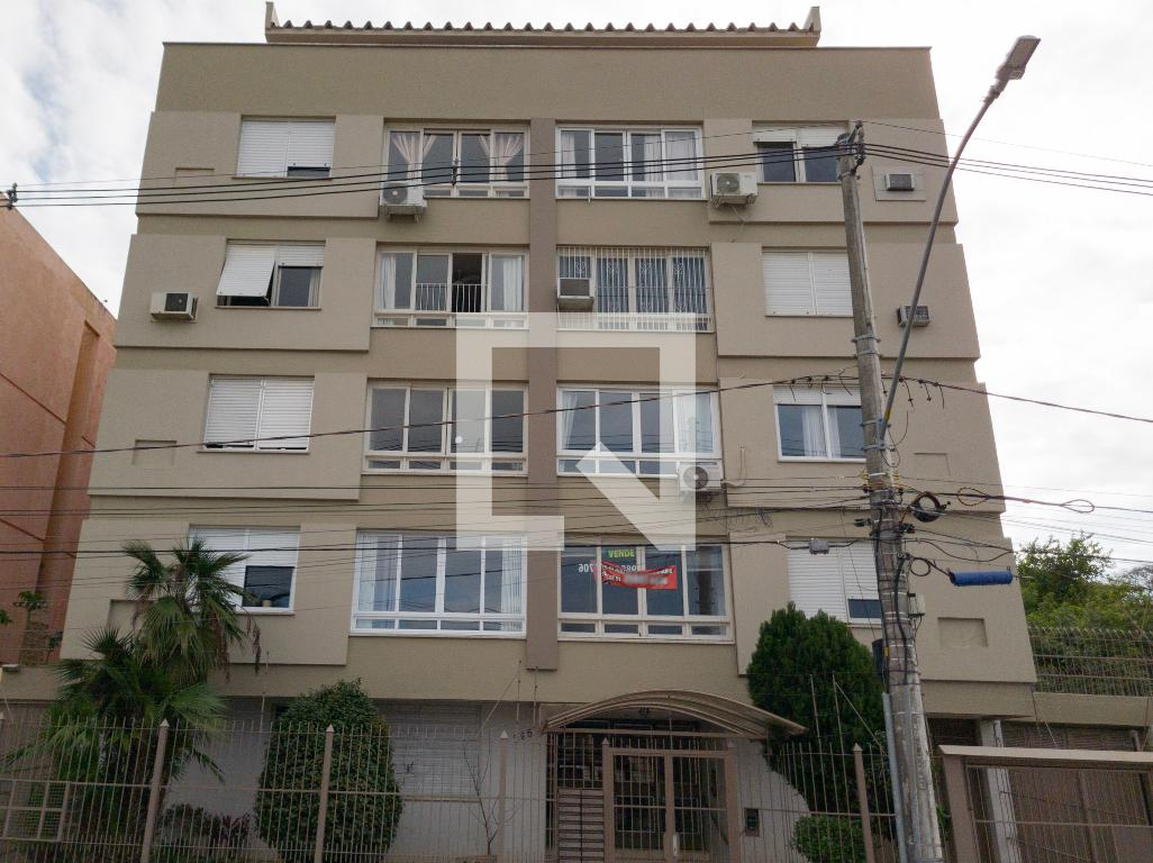 Fachada Condomínio em Avenida Coronel Gastão Haslocher Mazeron, 265