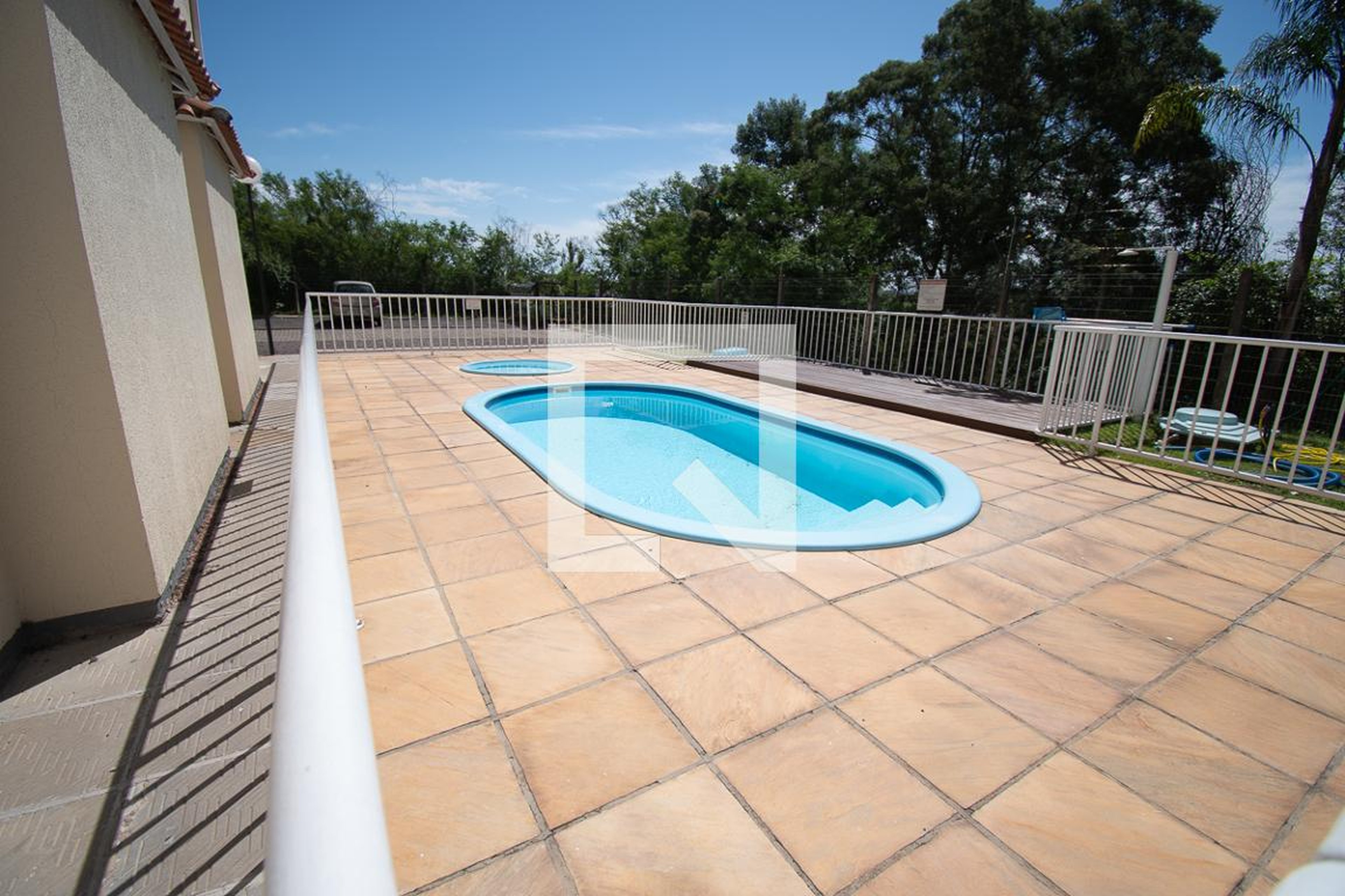 piscina - Residencial e Comercial Tom Jobim
