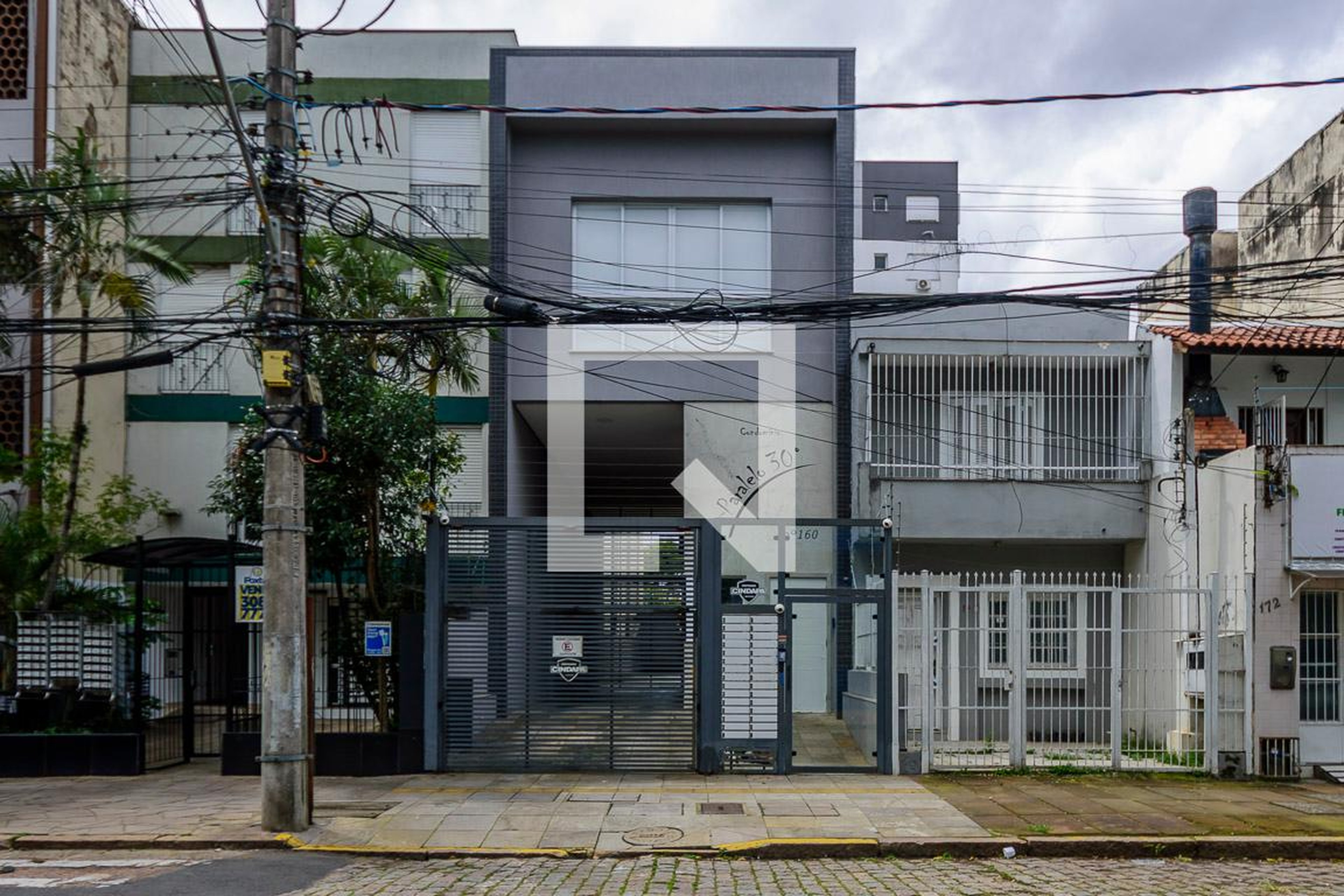 Fachada Condomínio em Rua Baronesa do Gravataí, 160