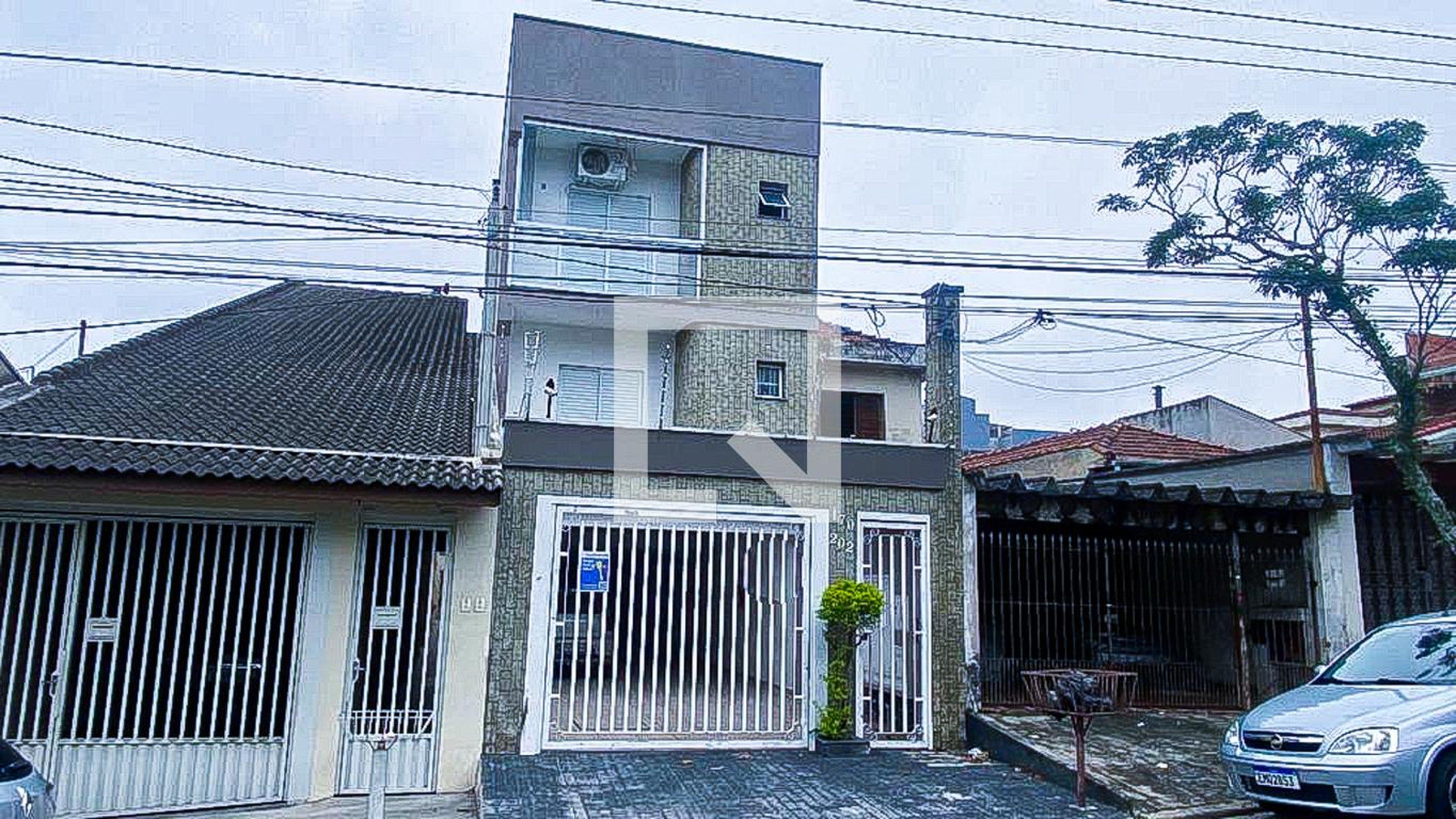 Fachada Condomínio em Rua Vera Cruz, 170