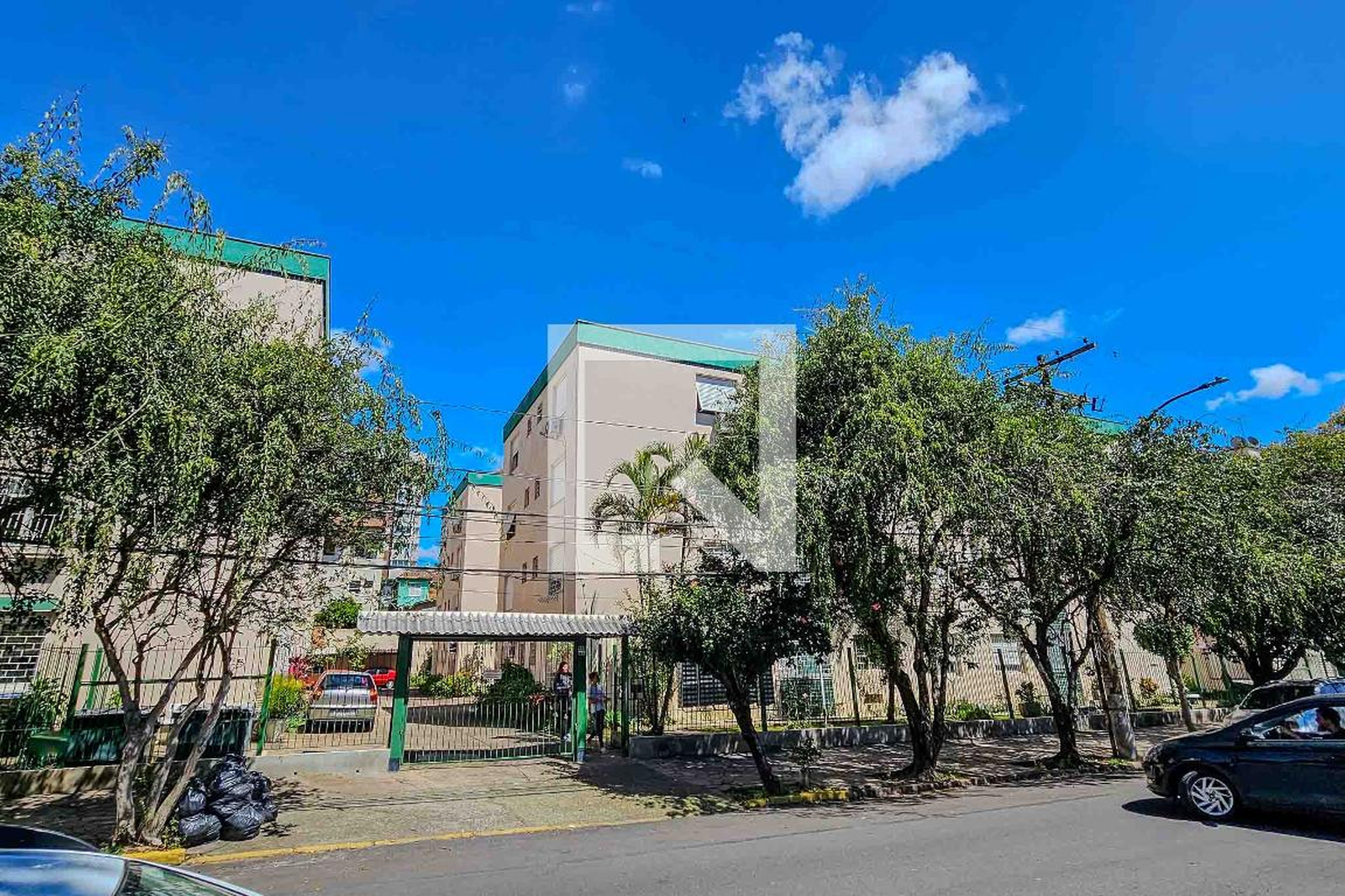 Fachada Condomínio em Rua Coronel João Corrêa, 97