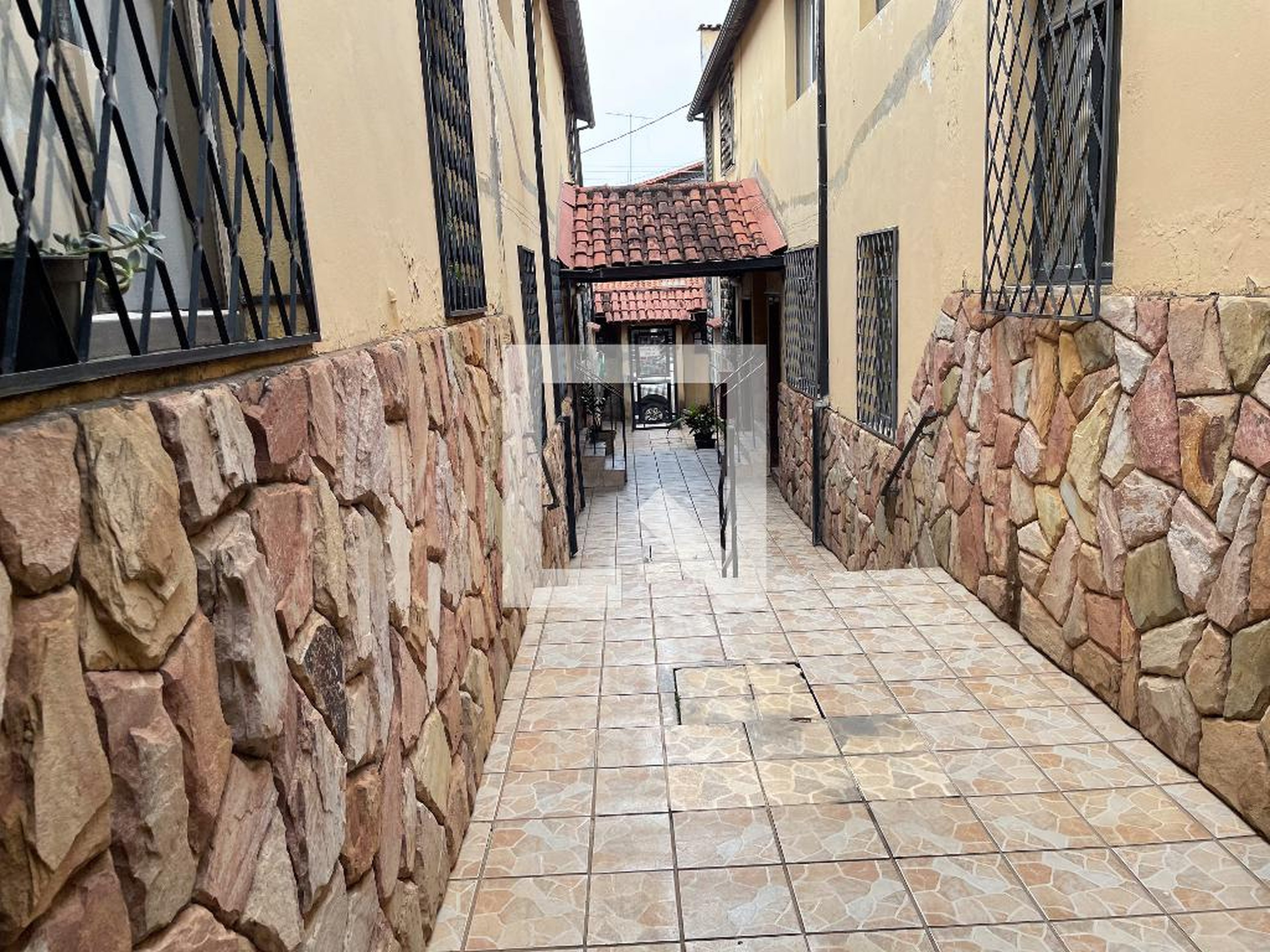 Entrada Condomínio em Rua das Mangueiras, 297