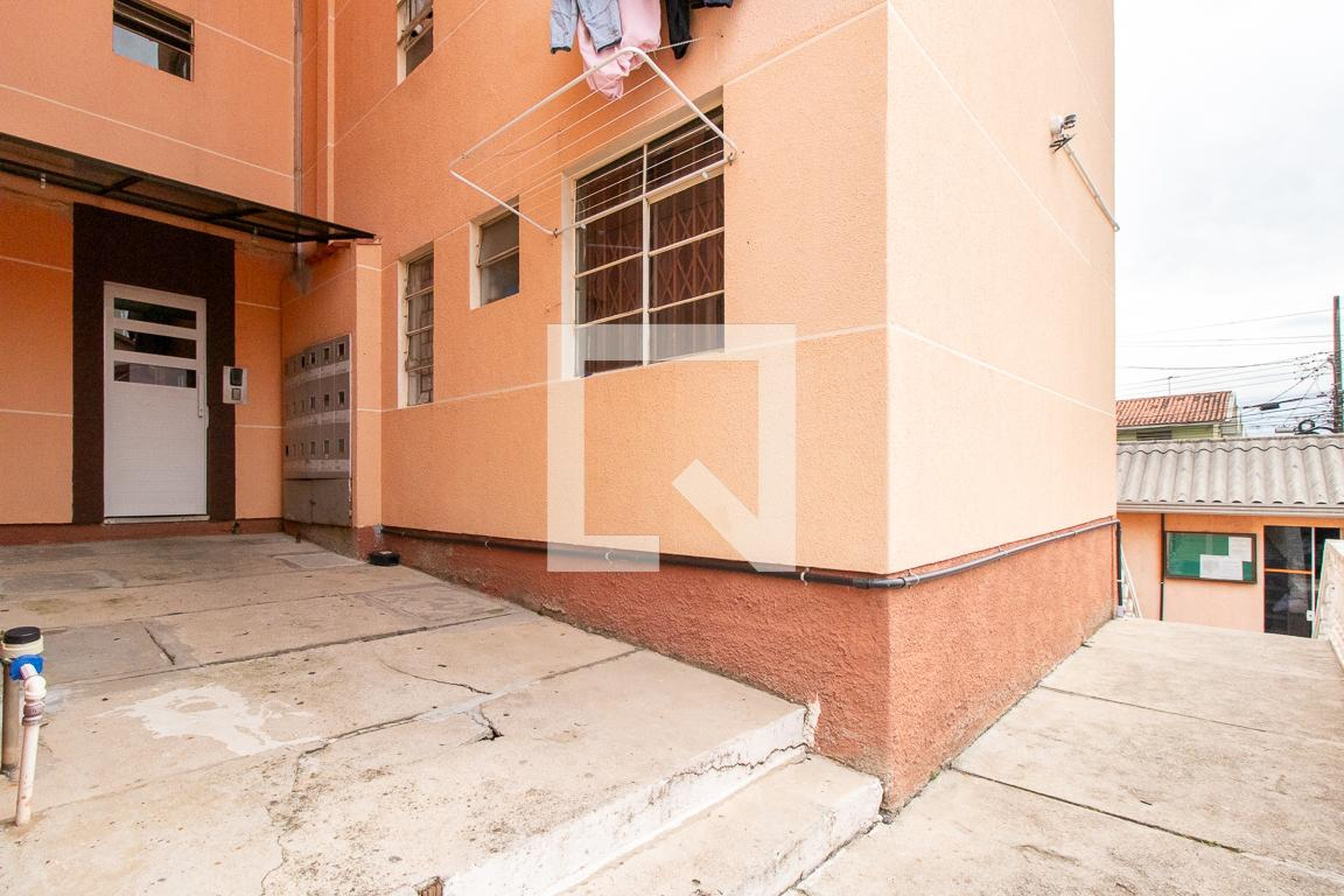 Hall de entrada Condomínio Moradias Augusta X