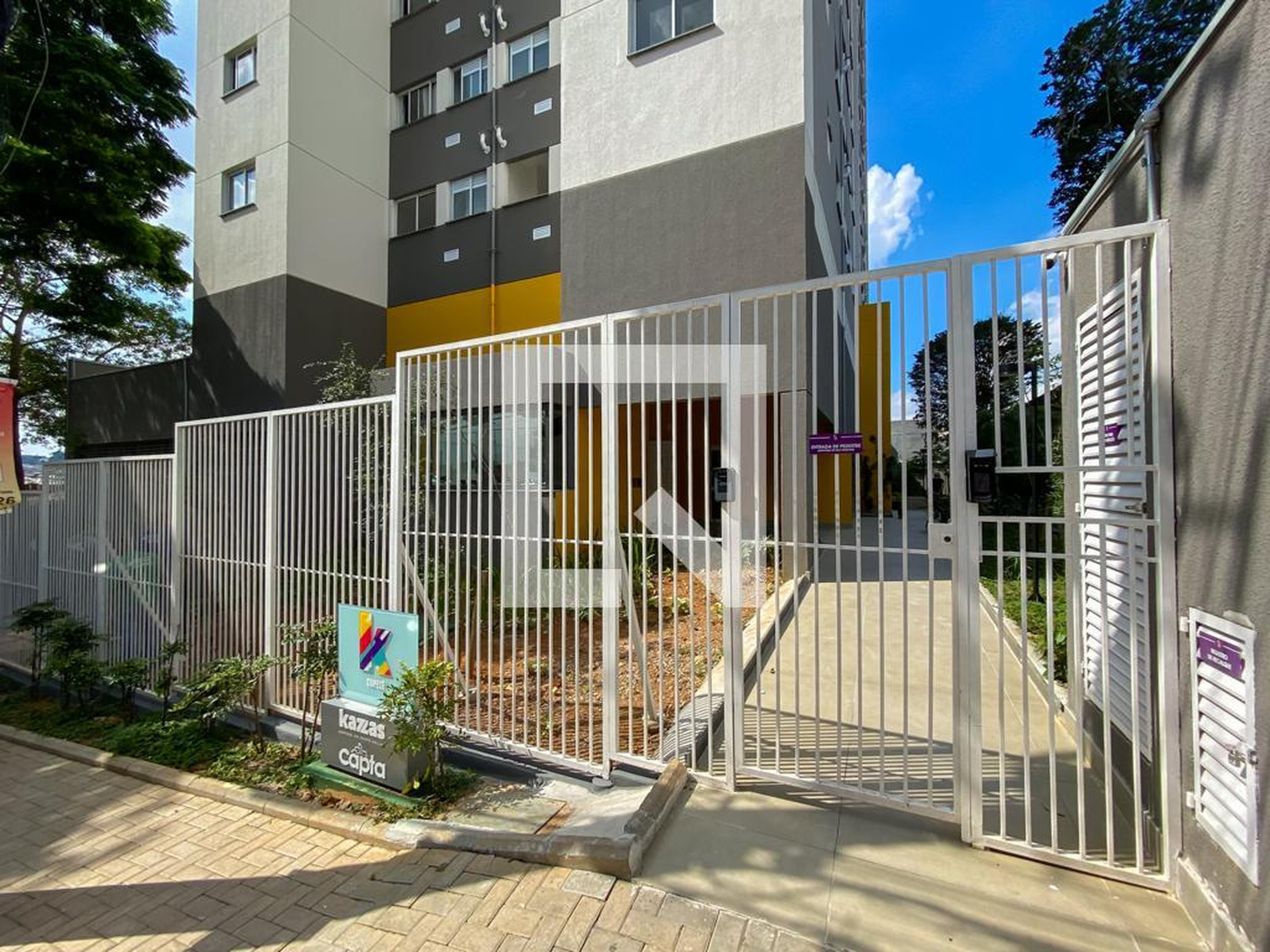 Fachada do Condomínio Condomínio K Cupecê