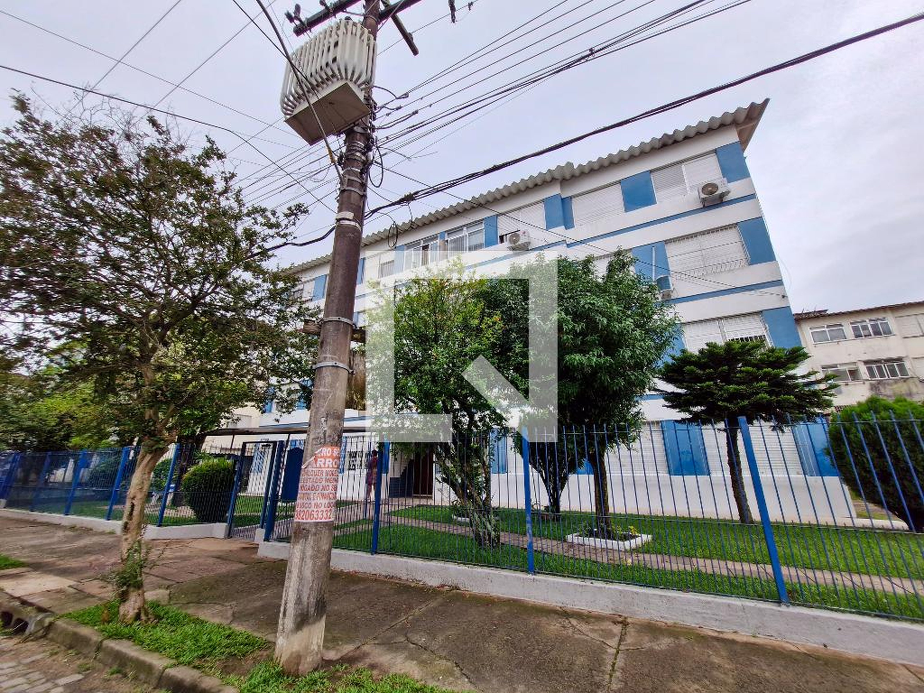 Fachada Condomínio em Rua Doutor Carlos Maria Bins, 230