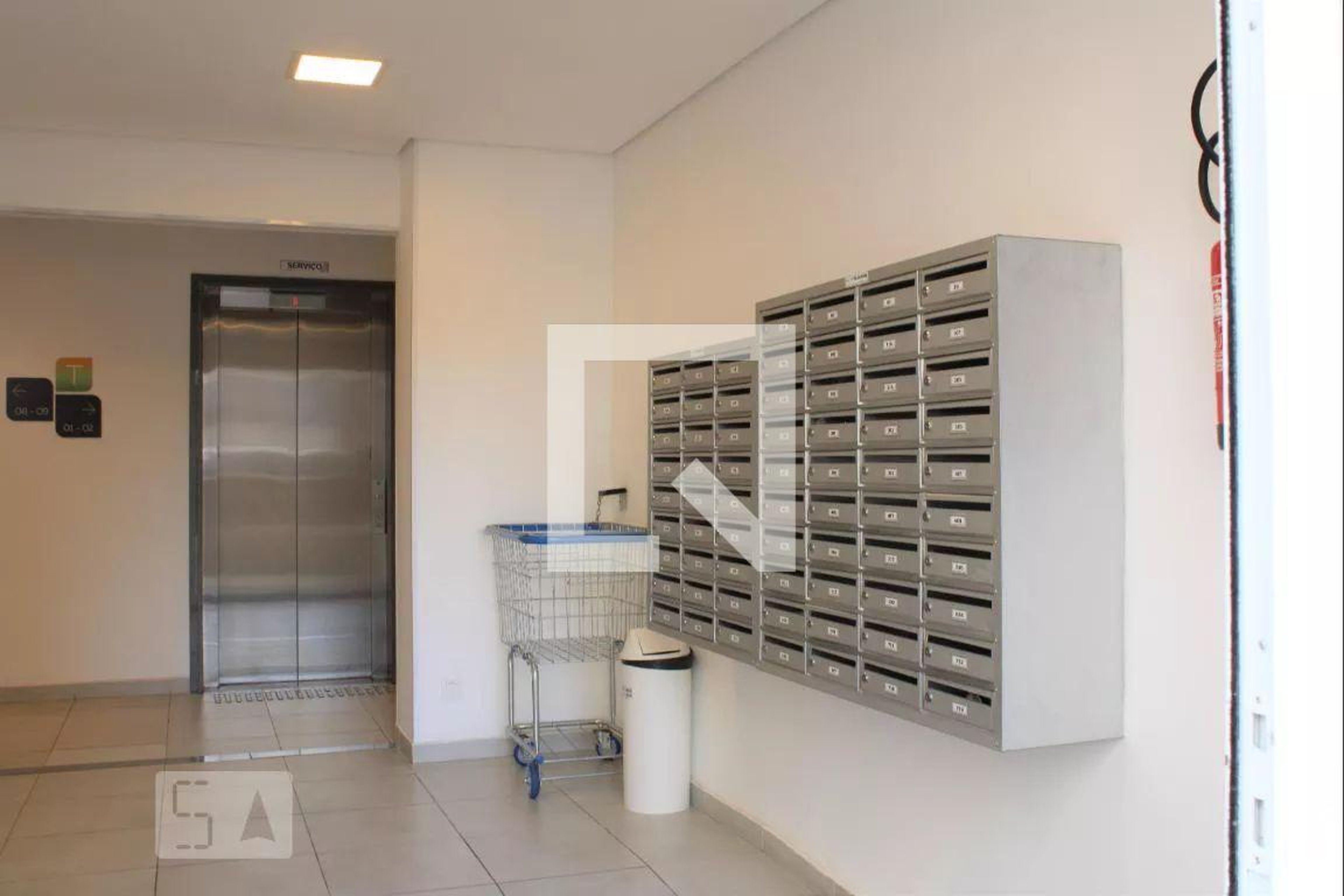 Hall de entrada Condomínio em Rua Xavier Krauss, 670