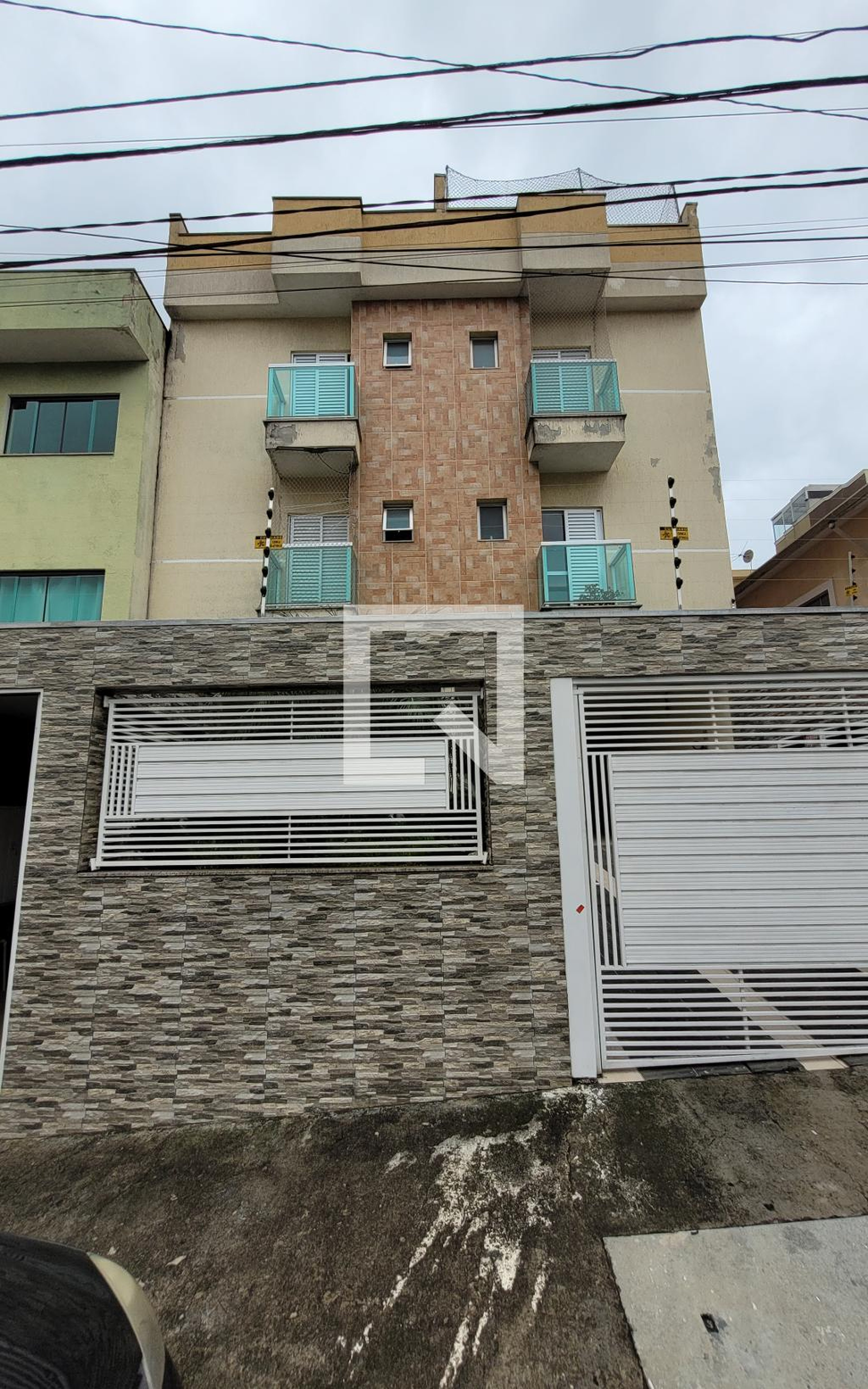 Fachada Condomínio em Rua Miquelina, 225