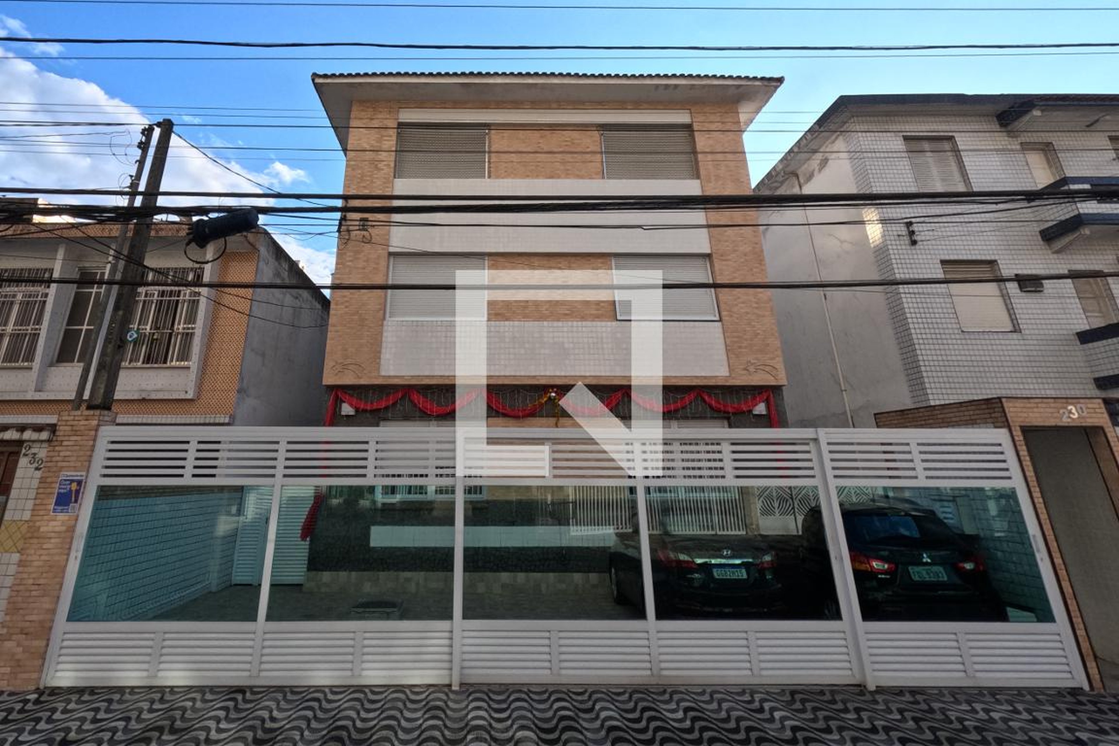 Fachada Condomínio em Rua Aureliano Coutinho, 230