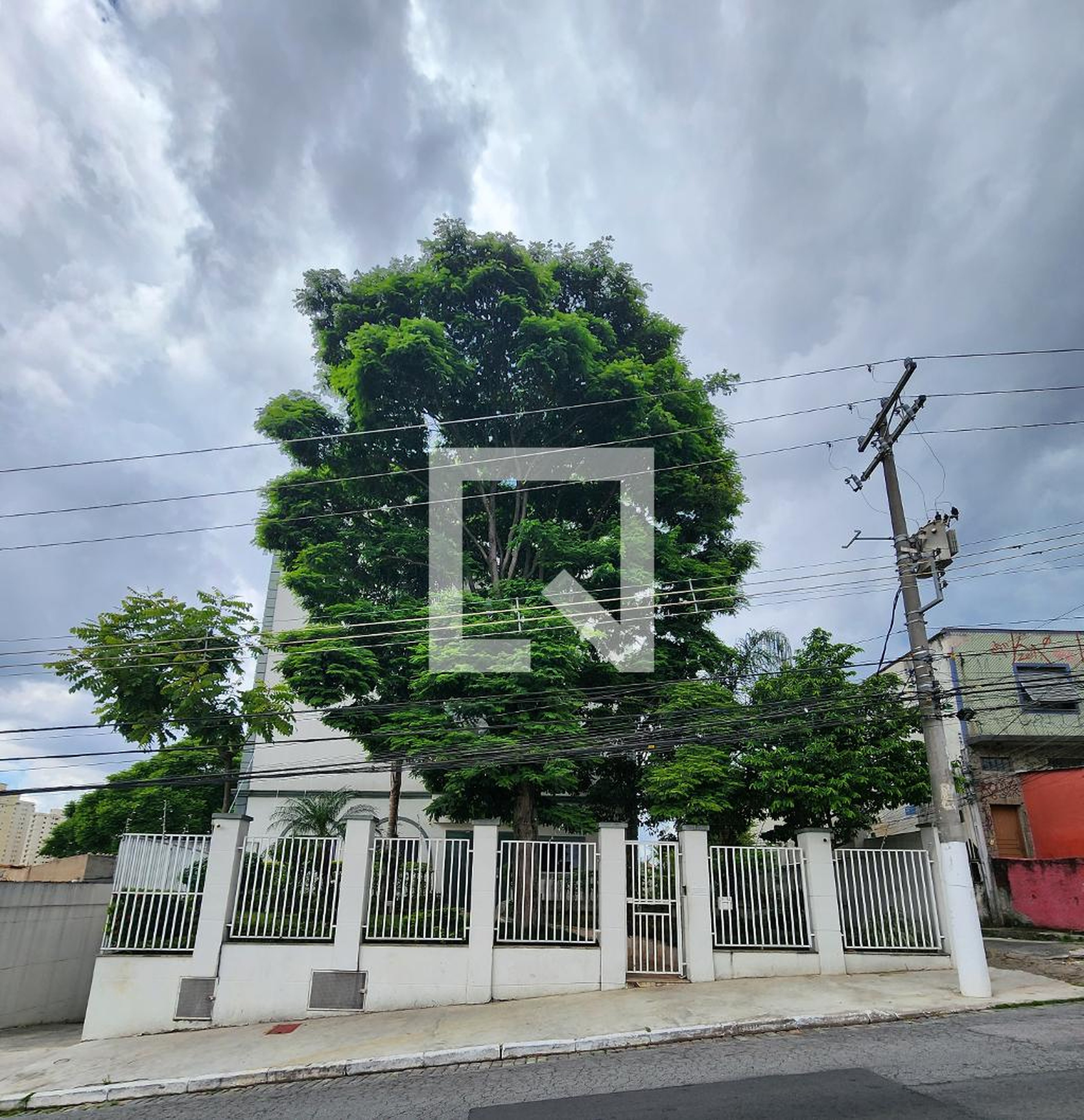 Fachada do Condomínio Condomínio Residência Angelina